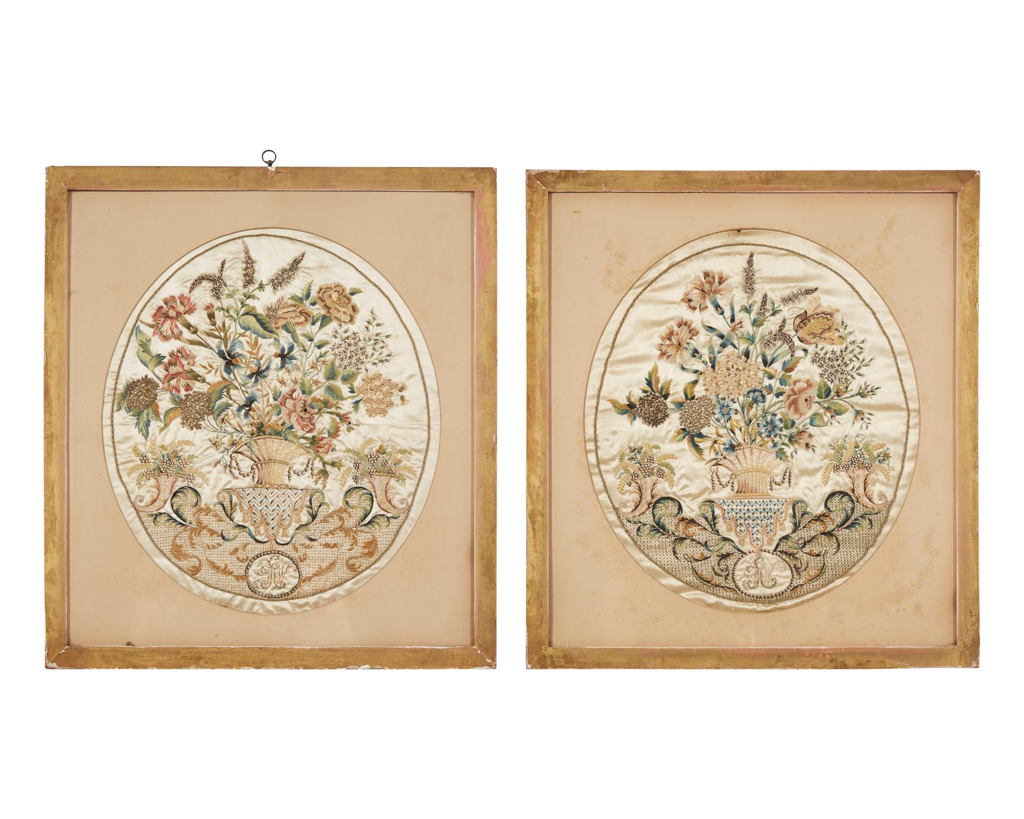 A pair of George III embroidered silk pictures of floral urns, circa 1780