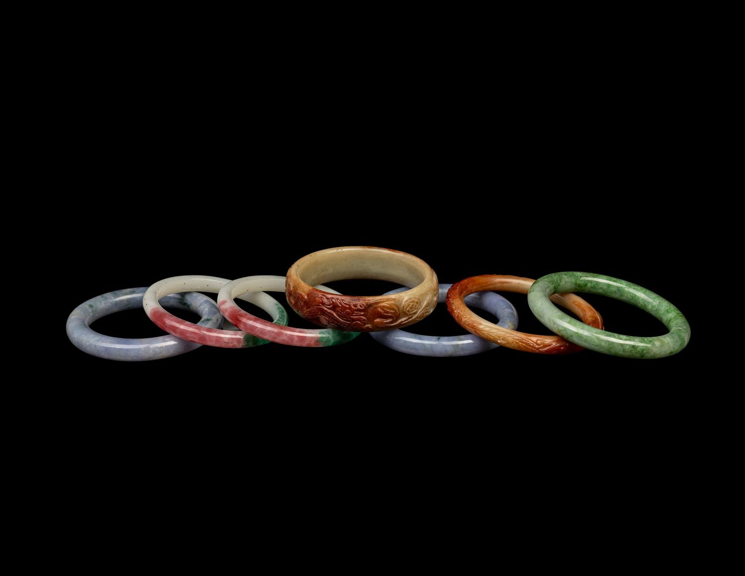 Seven Chinese Jade, Hardstone and Glass Bangles