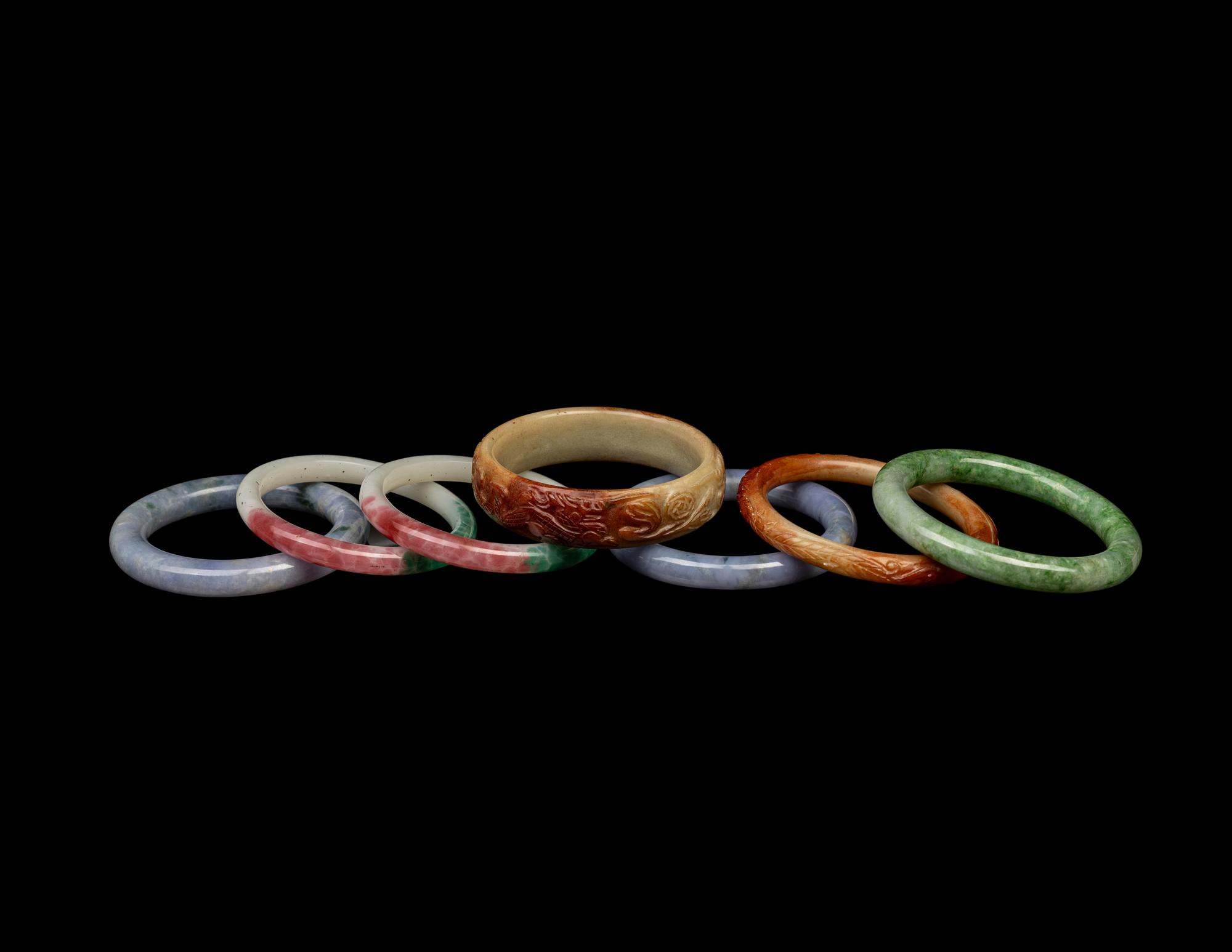Seven Chinese Jade, Hardstone and Glass Bangles