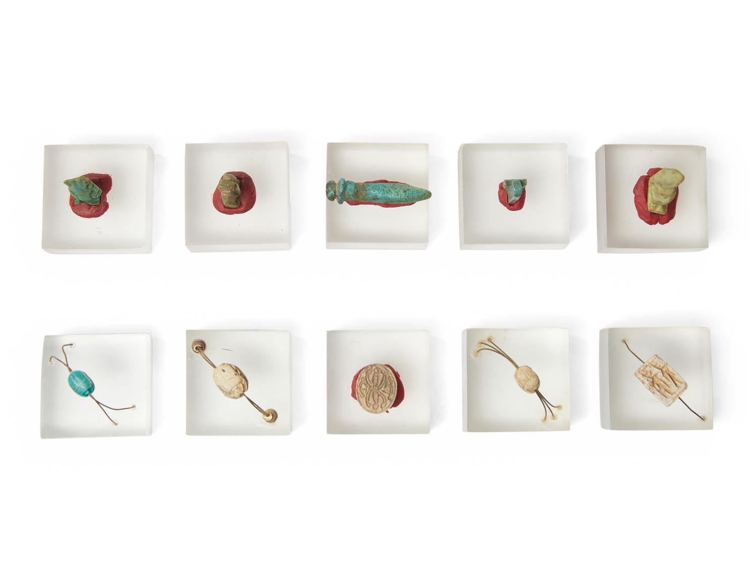 A Group of 10 Egyptian Faience Amulets and Scarabs