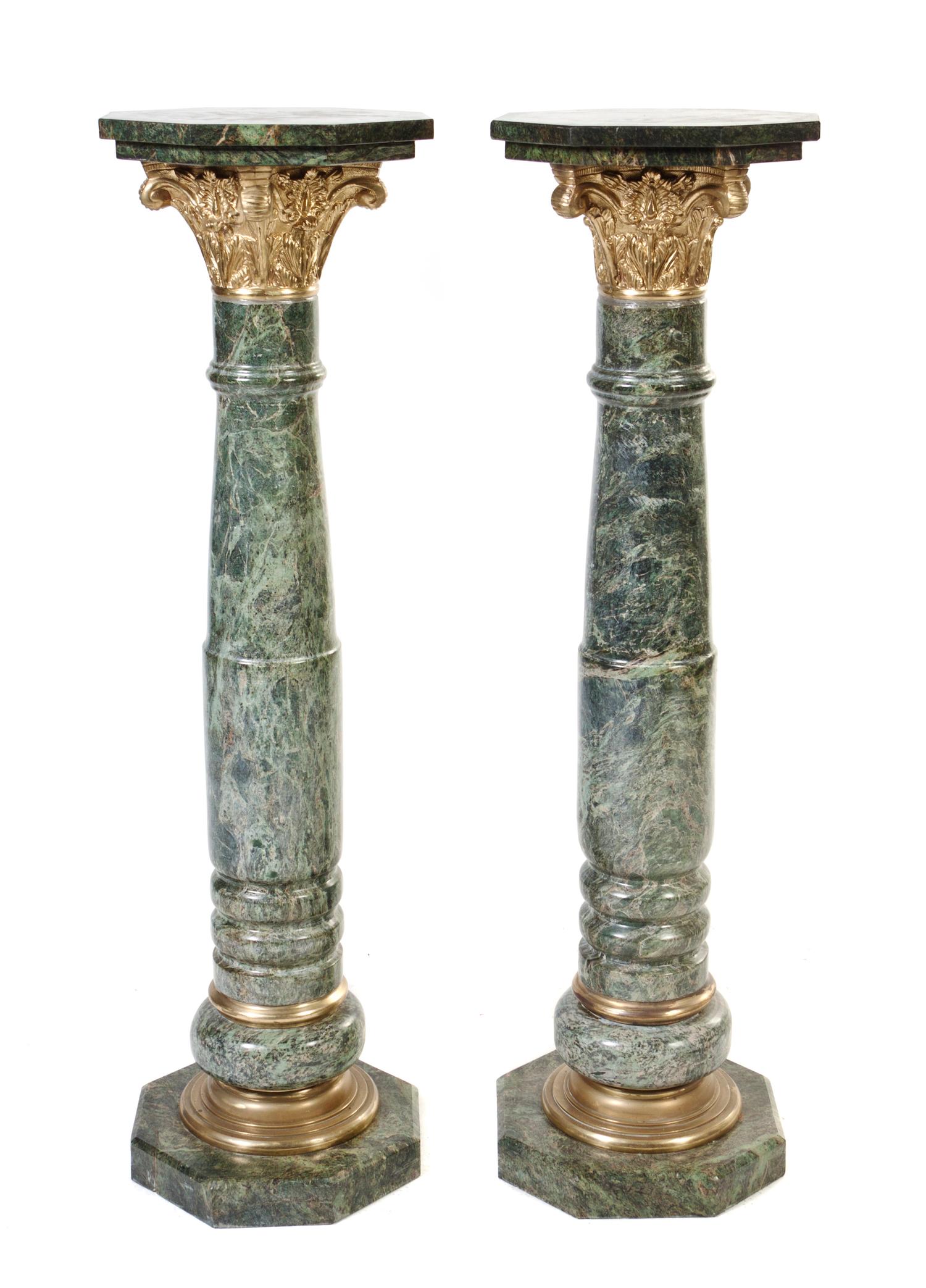 A Pair of Continental Marble and Bronze Mounted Pedestals, Height 48 1/2 inches.