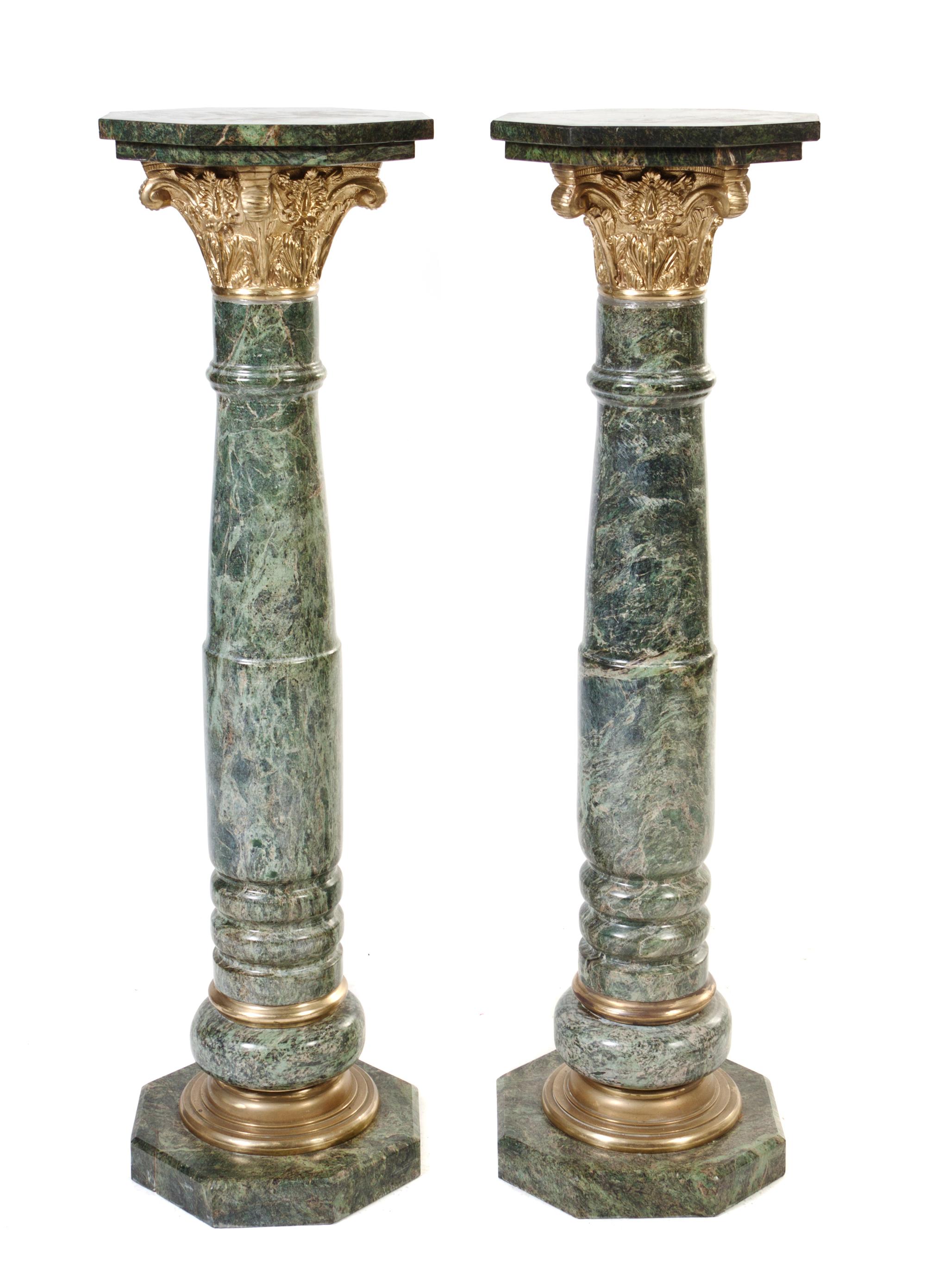 A Pair of Continental Marble and Bronze Mounted Pedestals, Height 48 1/2 inches.