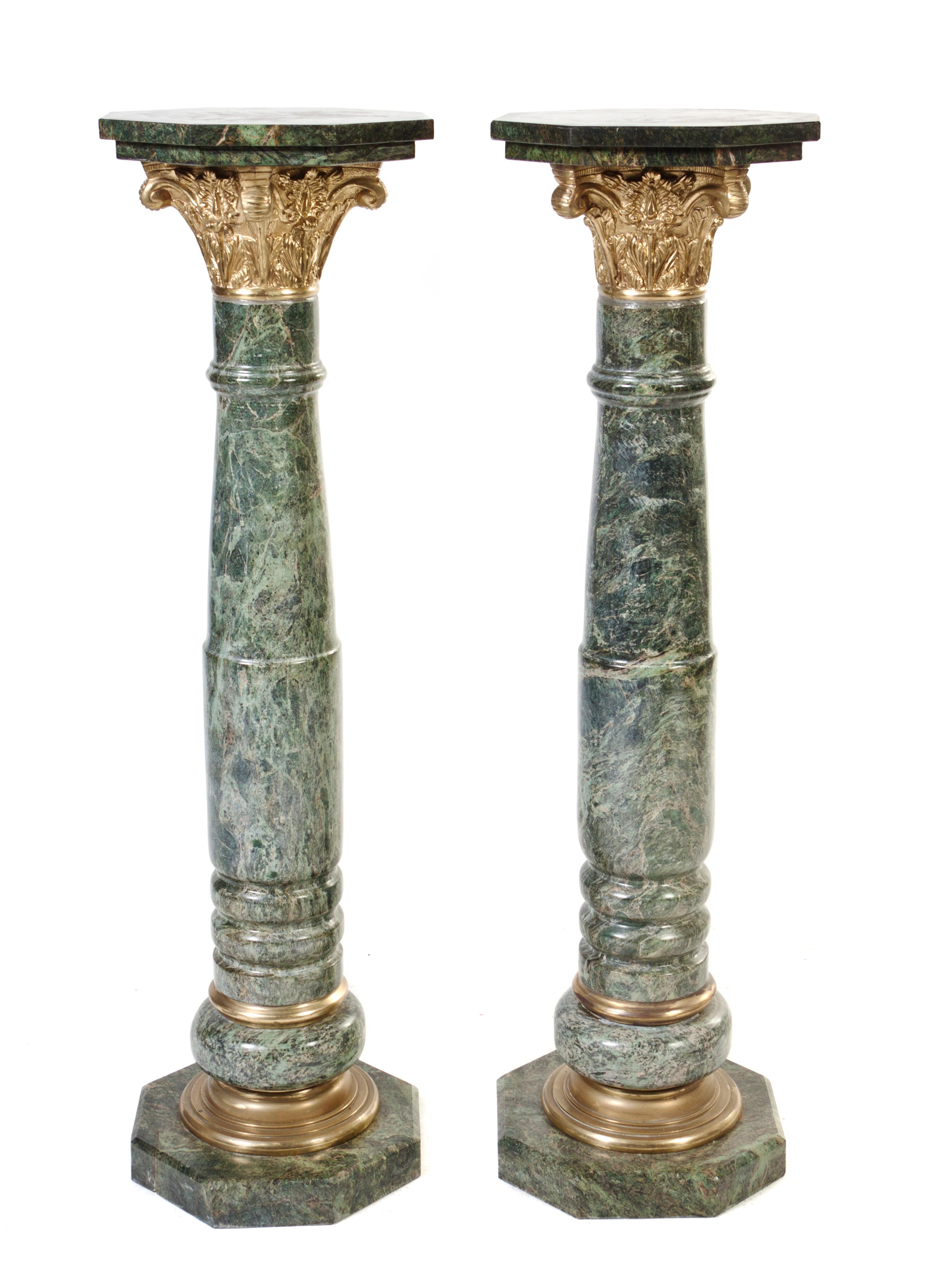 A Pair of Continental Marble and Bronze Mounted Pedestals, Height 48 1/2 inches.