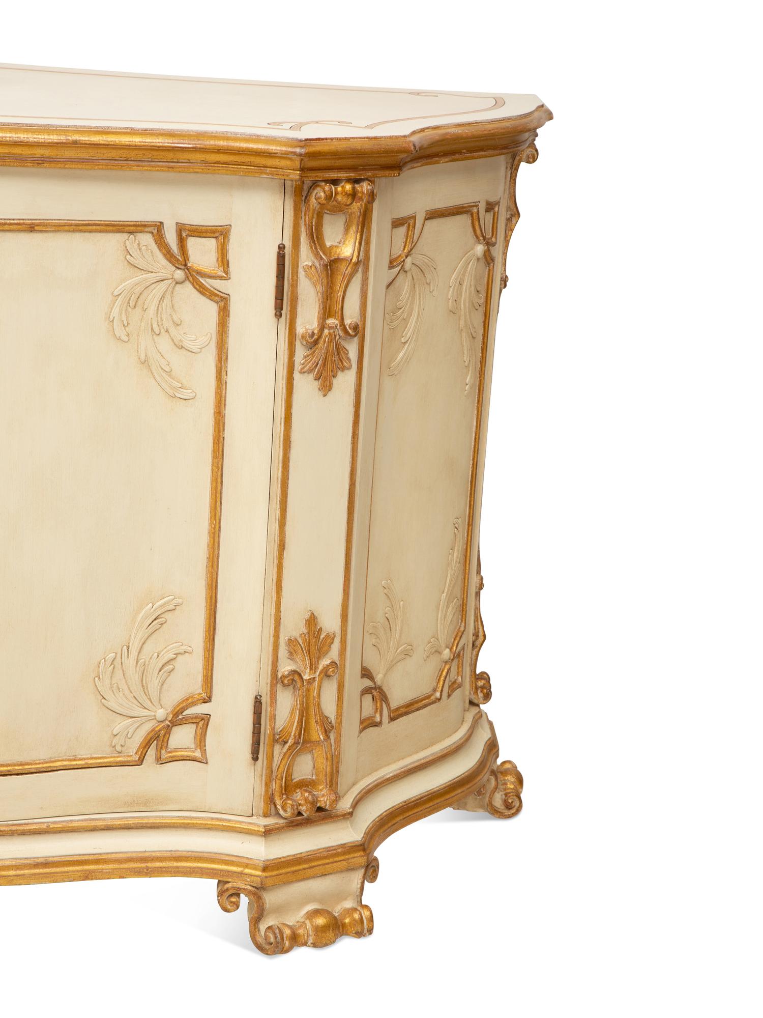 A Pair of Painted and Parcel Gilt Serpentine-Front Cabinets