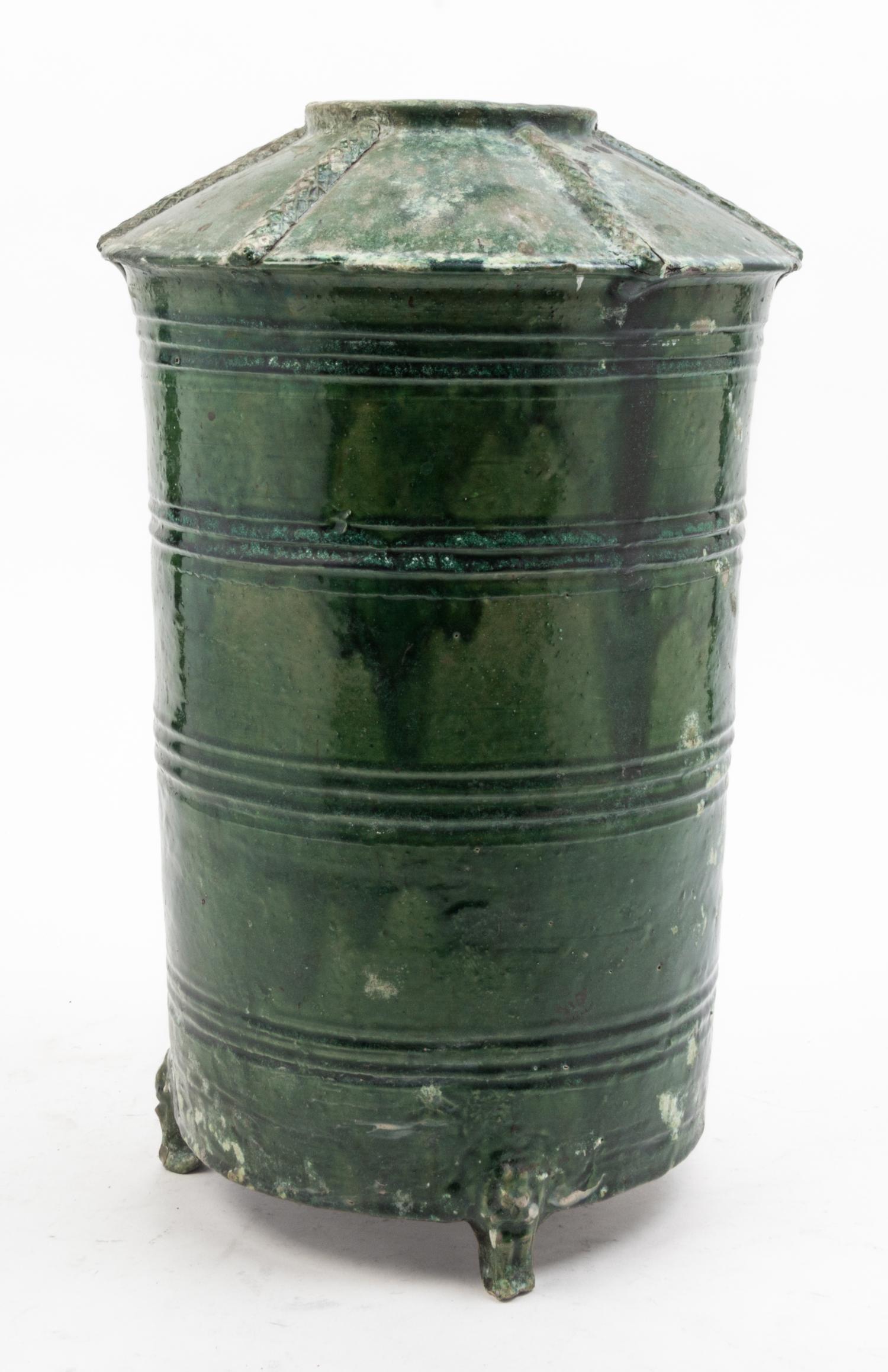 A Green Glazed Pottery Vessel Height 16 1/4 inches.