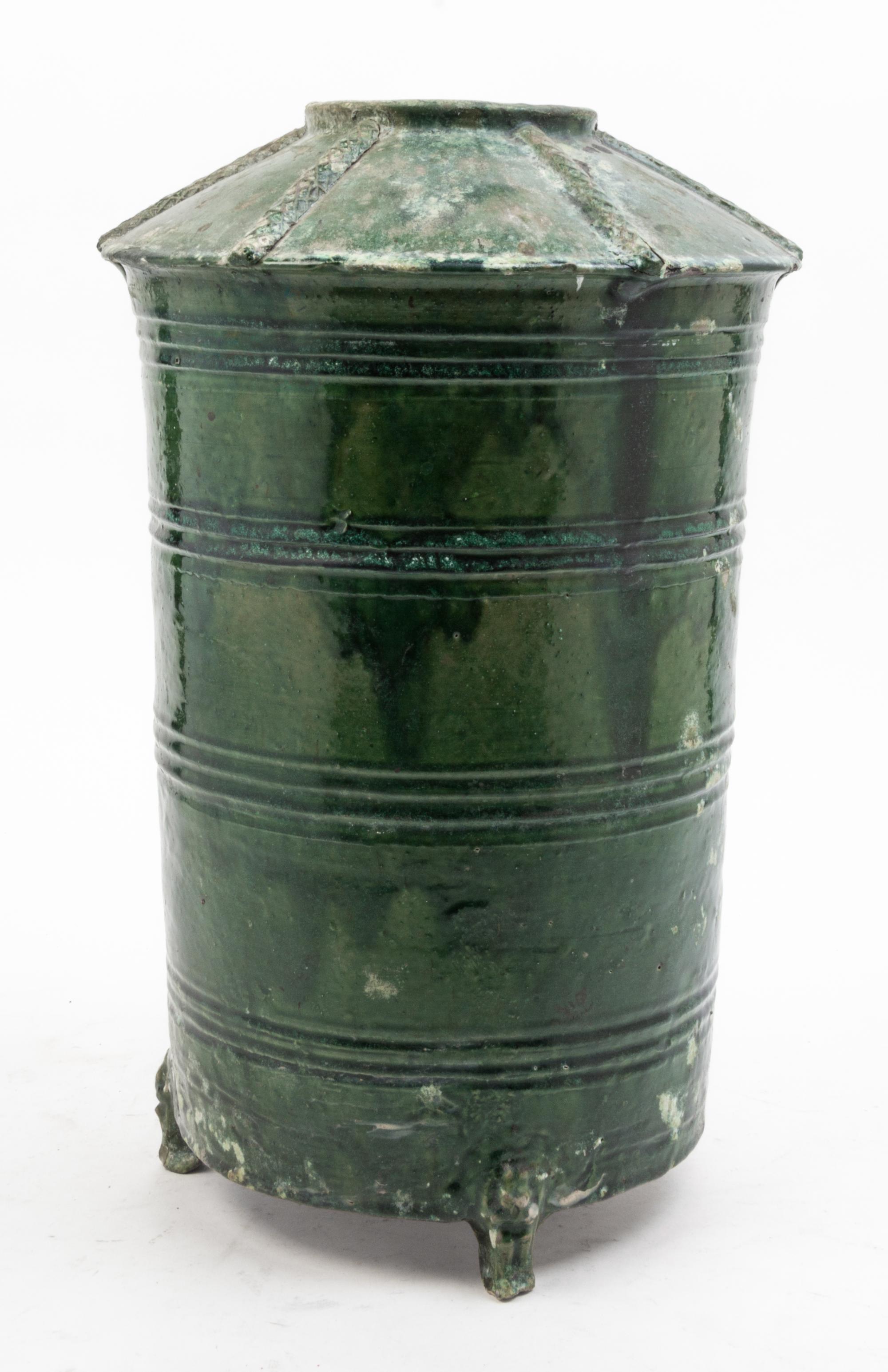 A Green Glazed Pottery Vessel Height 16 1/4 inches.
