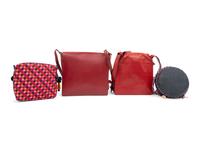 Four Designer Shoulder Bags: One Hermès, One Yves Saint Laurent, and Two Bottega Veneta, 1980-90s