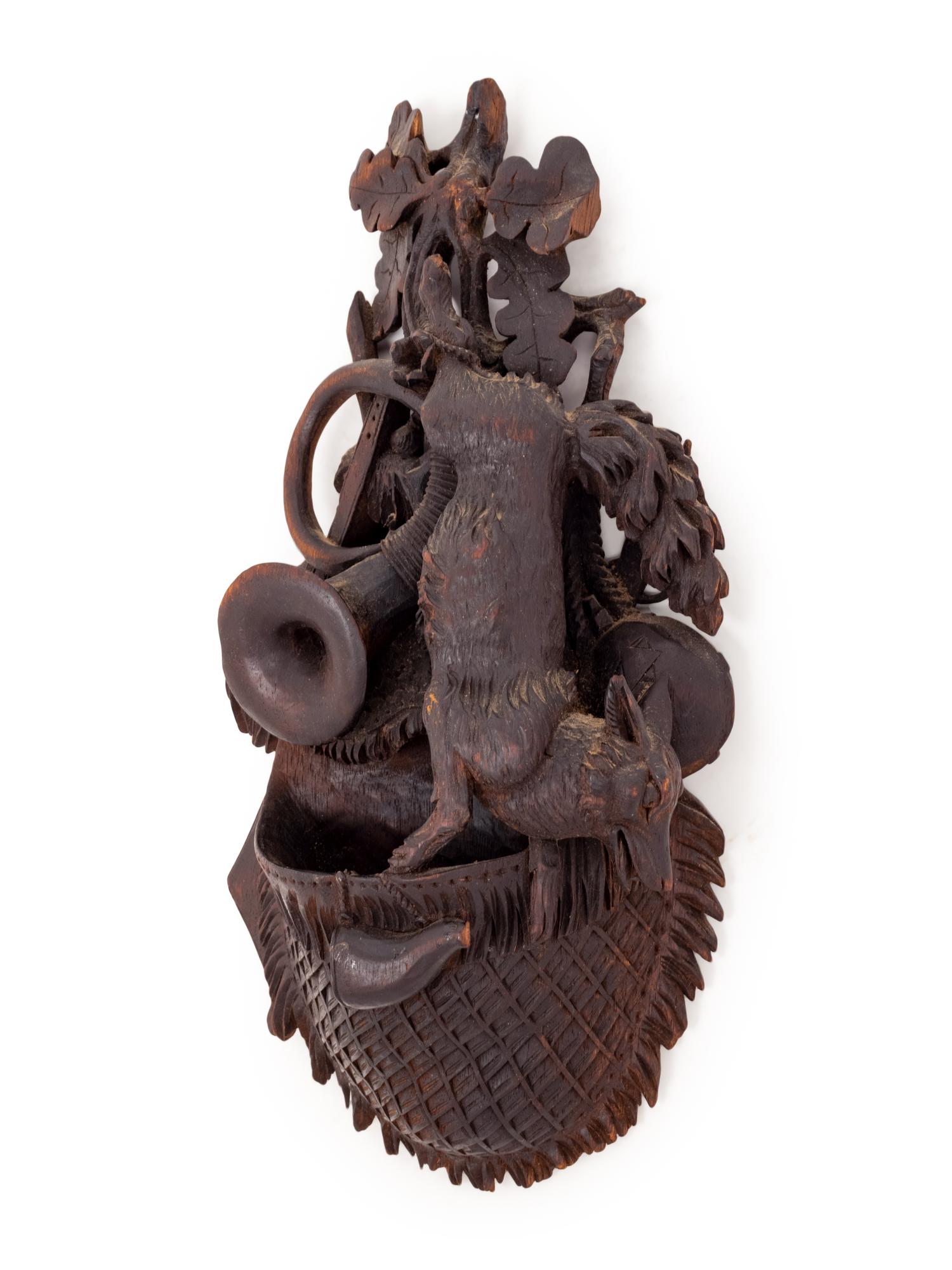 A Black Forest Carved Wall Pocket