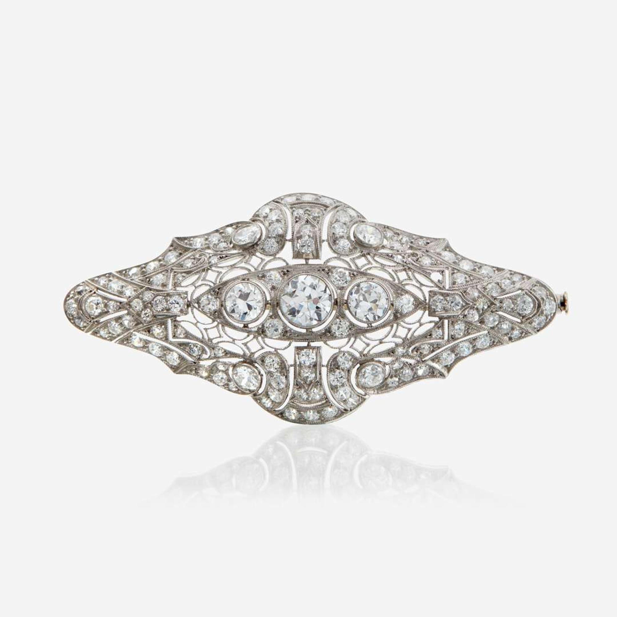A diamond and platinum brooch