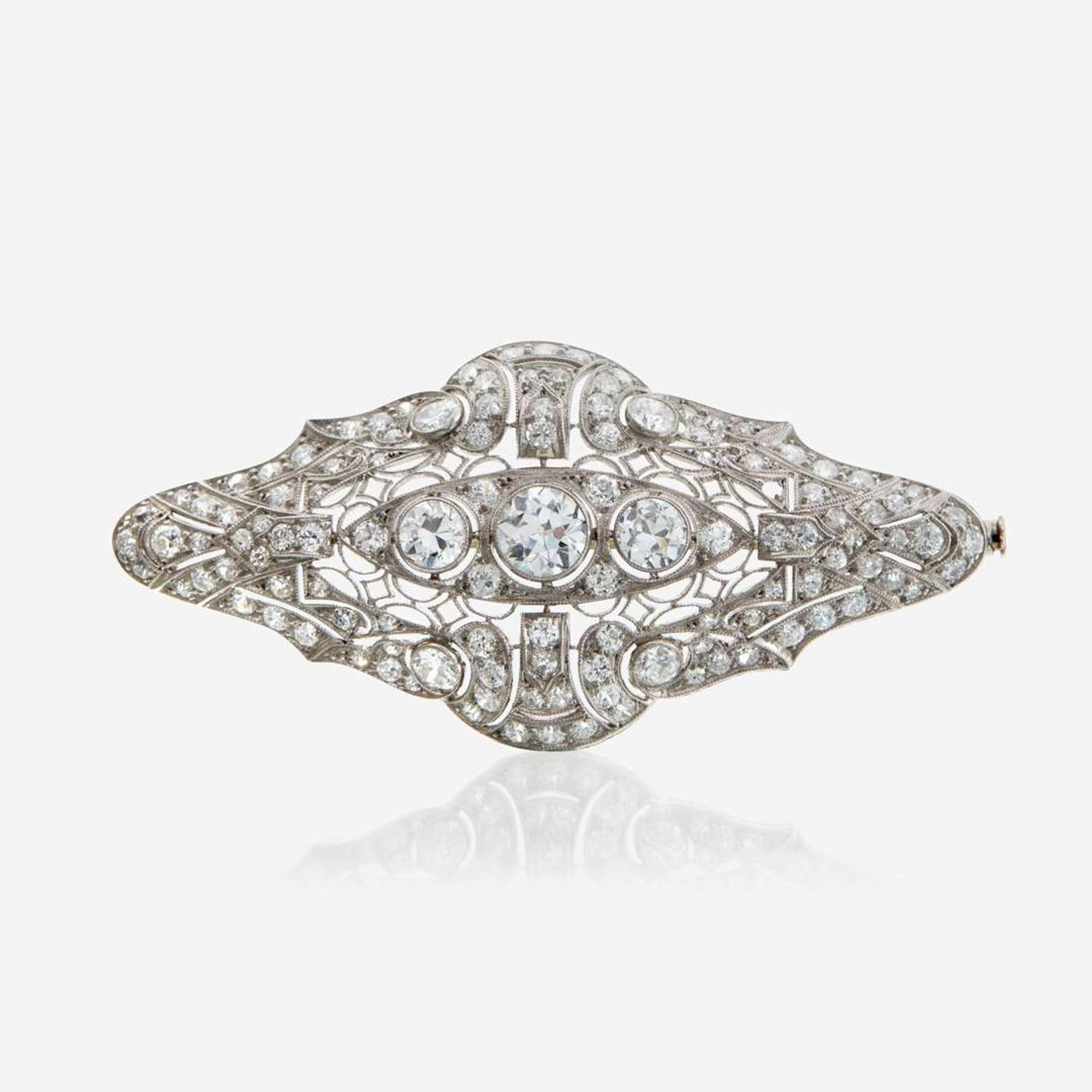 A diamond and platinum brooch
