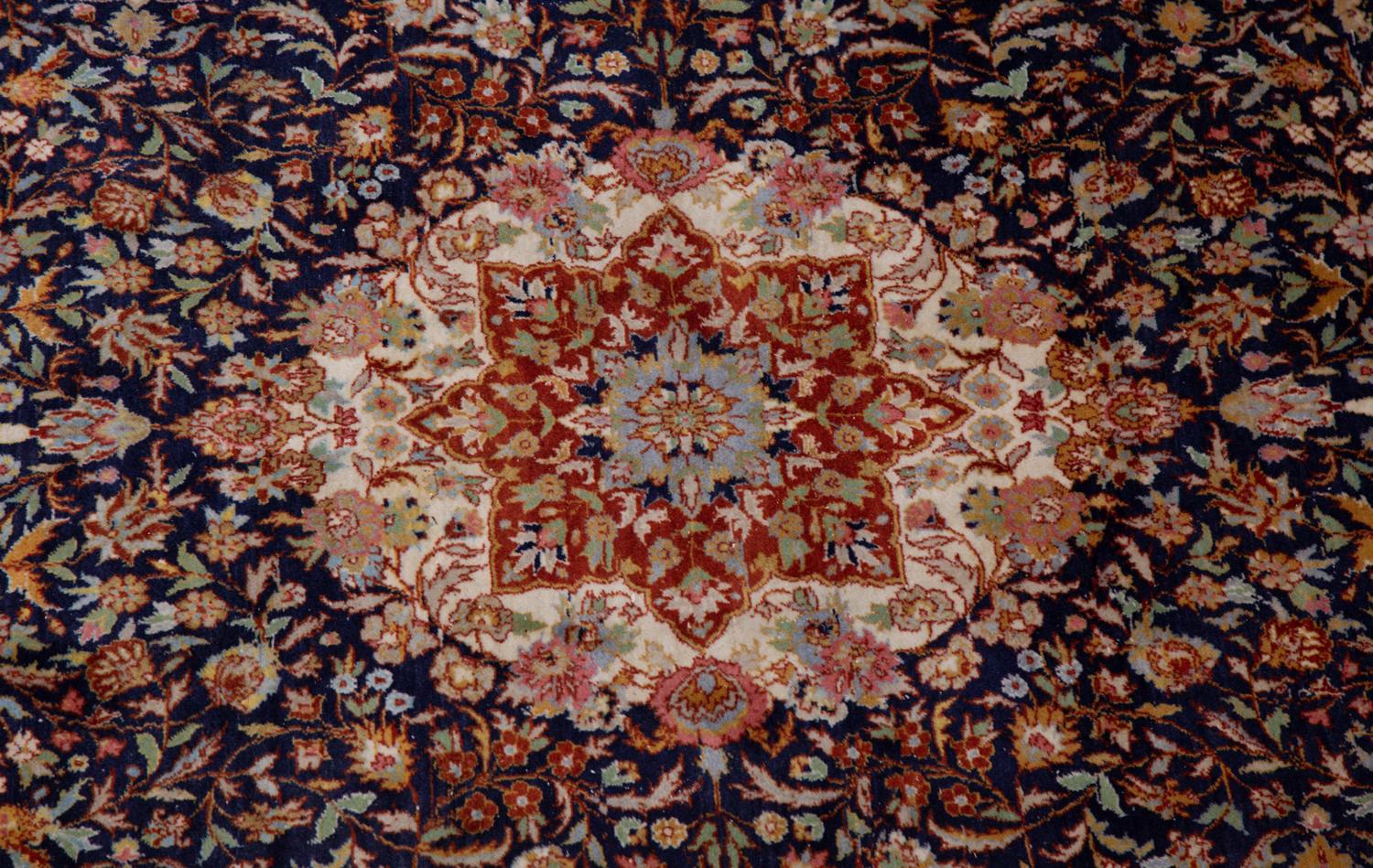 A Tabriz Wool Rug
