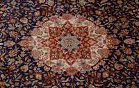 A Tabriz Wool Rug