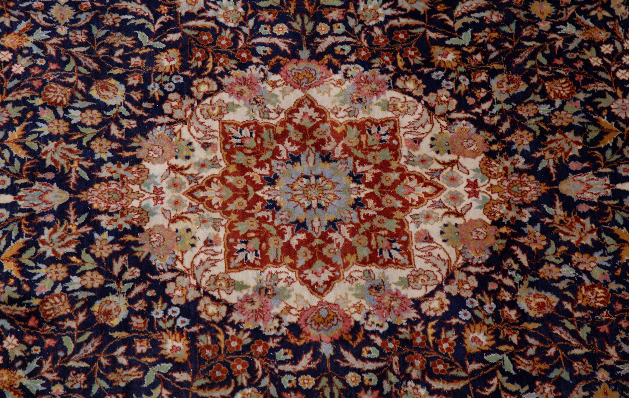 A Tabriz Wool Rug