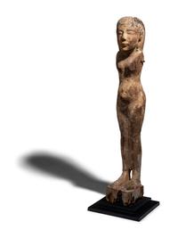 An Egyptian Wood Female Figure