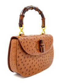 A Gucci Brown Ostrich Bamboo Top Handle Handbag, 7" H x 10.5" W x 2.5" D; Handle drop: 4.5".