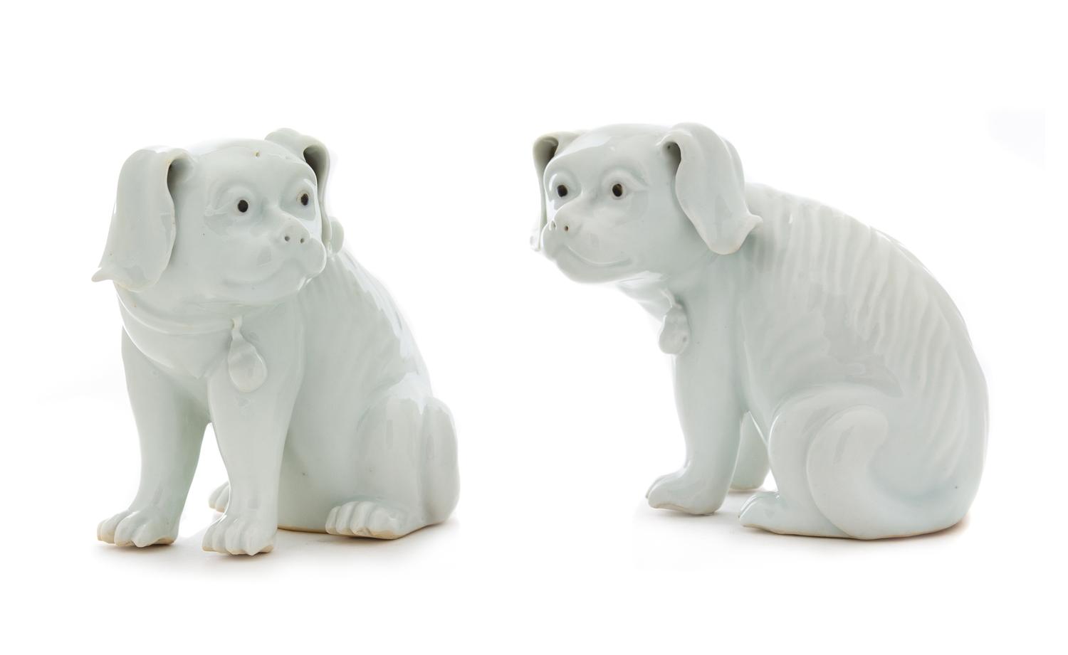 A Pair of Chinese Export White Glazed Porcelain Dogs Height 6 1/4 inches. — LATE 19TH/EARLY 20TH CENTURY