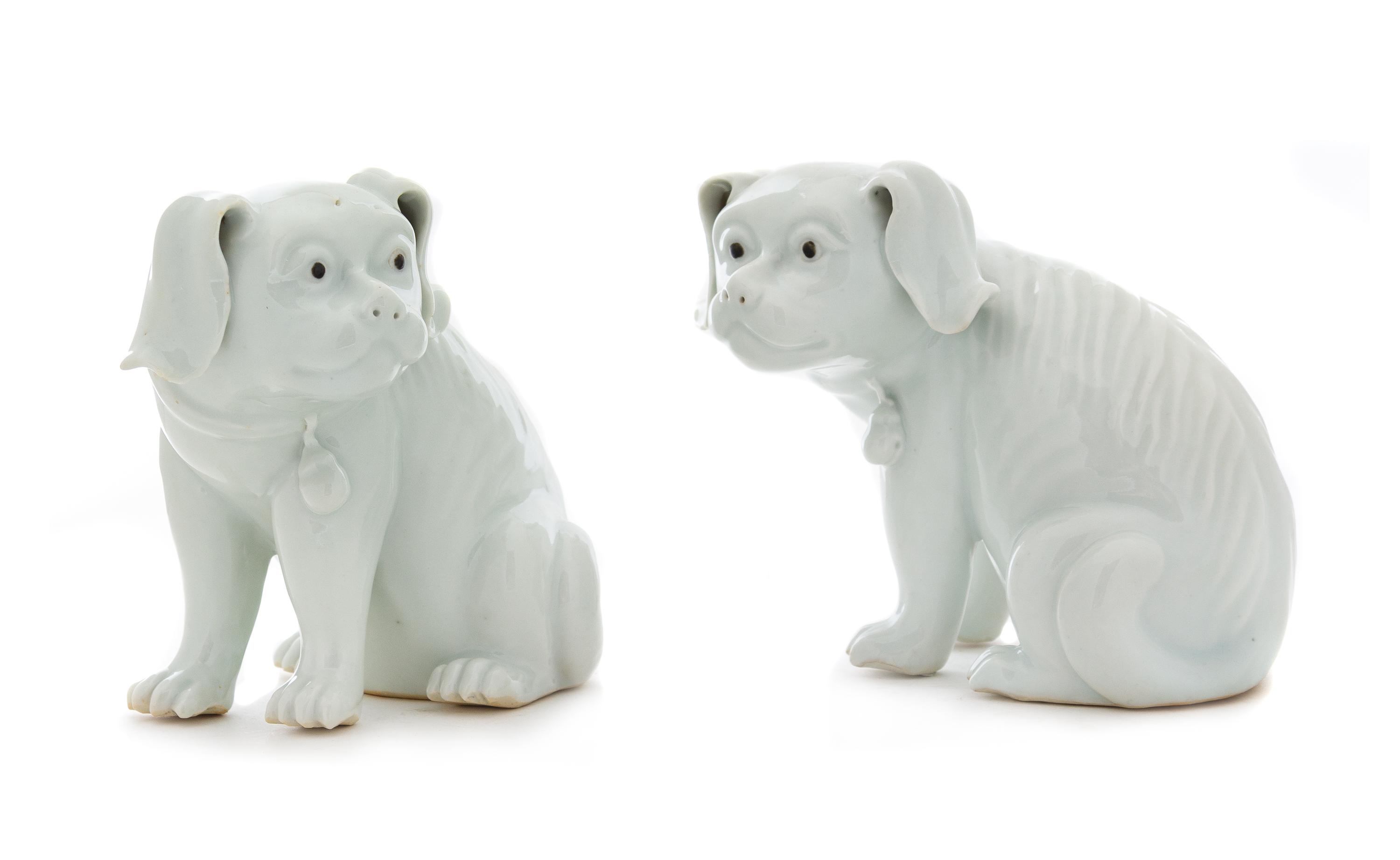 A Pair of Chinese Export White Glazed Porcelain Dogs Height 6 1/4 inches. — LATE 19TH/EARLY 20TH CENTURY