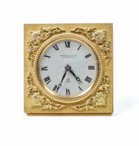 A Swiss Gilt Bronze Table Clock Height 2 7/8 inches. — FIRST HALF 20TH CENTURY