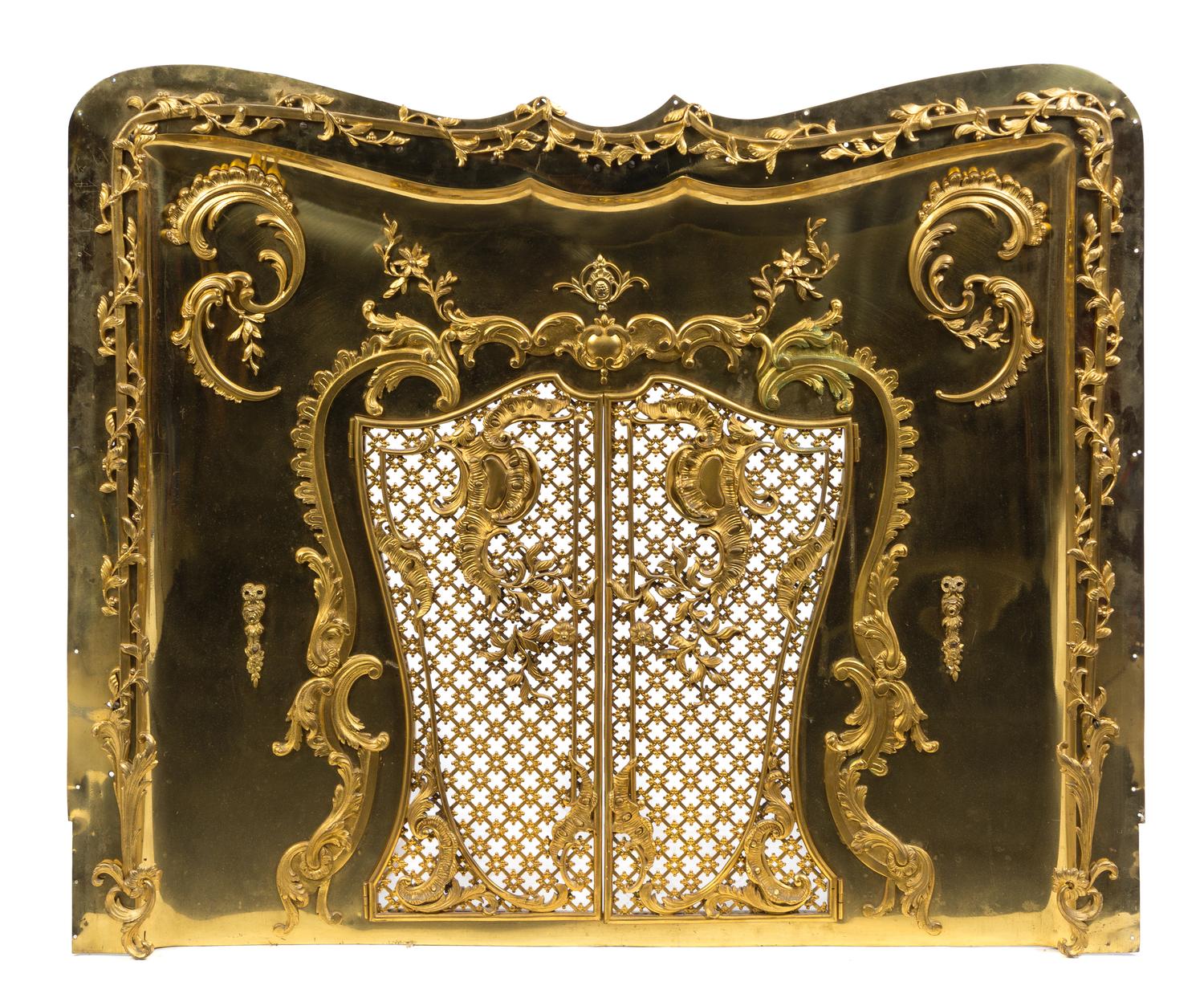 A Continental Gilt Bronze Mounted Fireplace Gate Height 37 x width 43 1/4 inches.