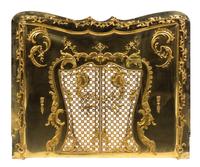 A Continental Gilt Bronze Mounted Fireplace Gate Height 37 x width 43 1/4 inches.