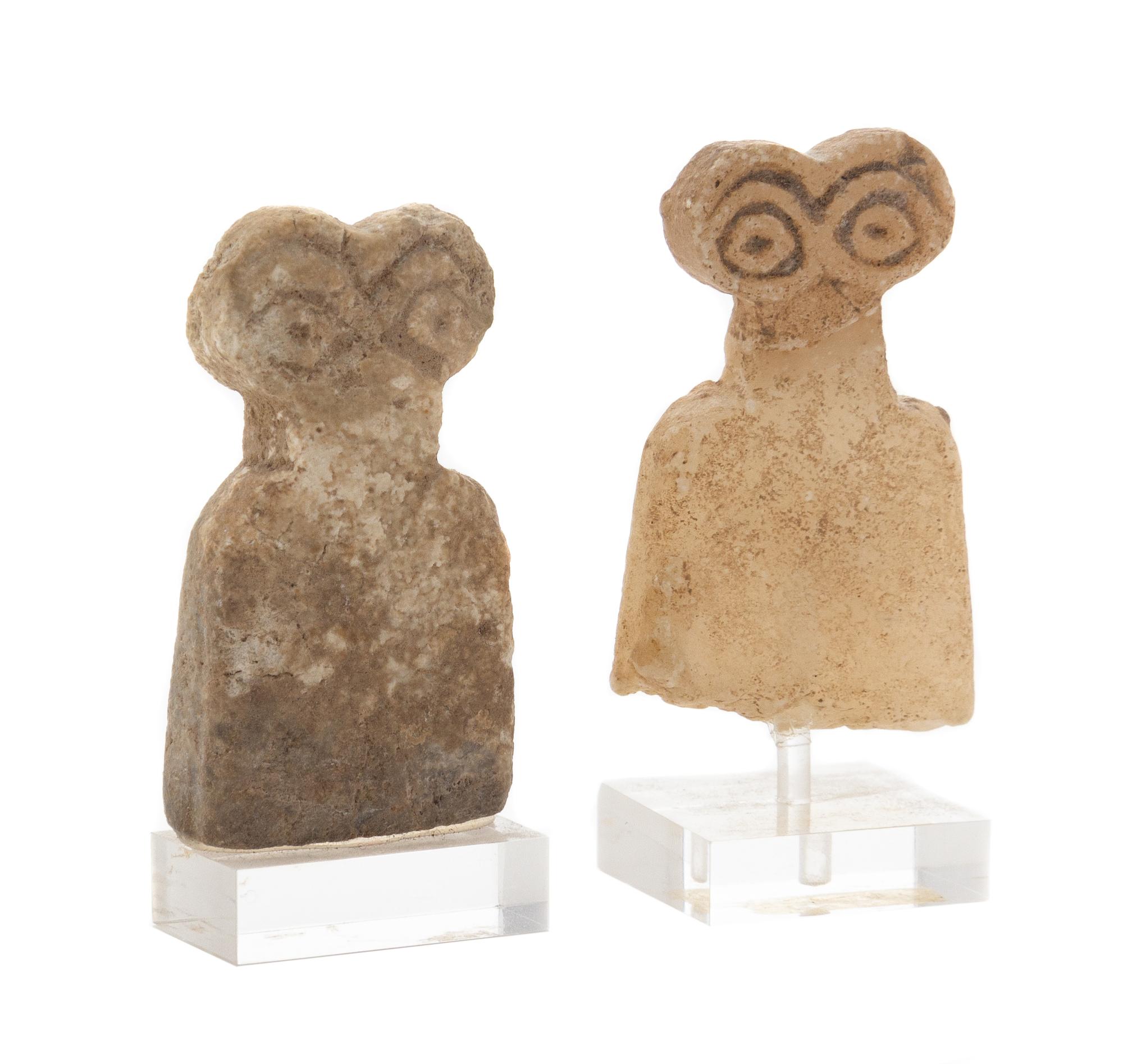 Two Syrian Stone Eye Idols Height of taller 1 3/8 inches. — CIRCA 4TH MILLENNIUM B.C.E.