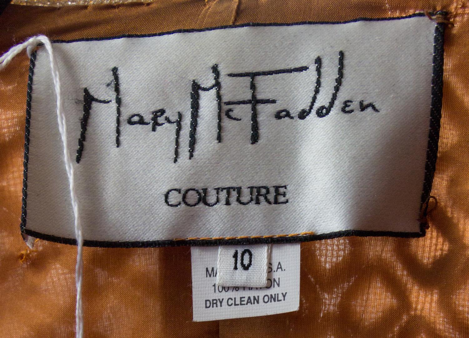 A Mary McFadden Gold Embroidered Evening Coat, Size 10.