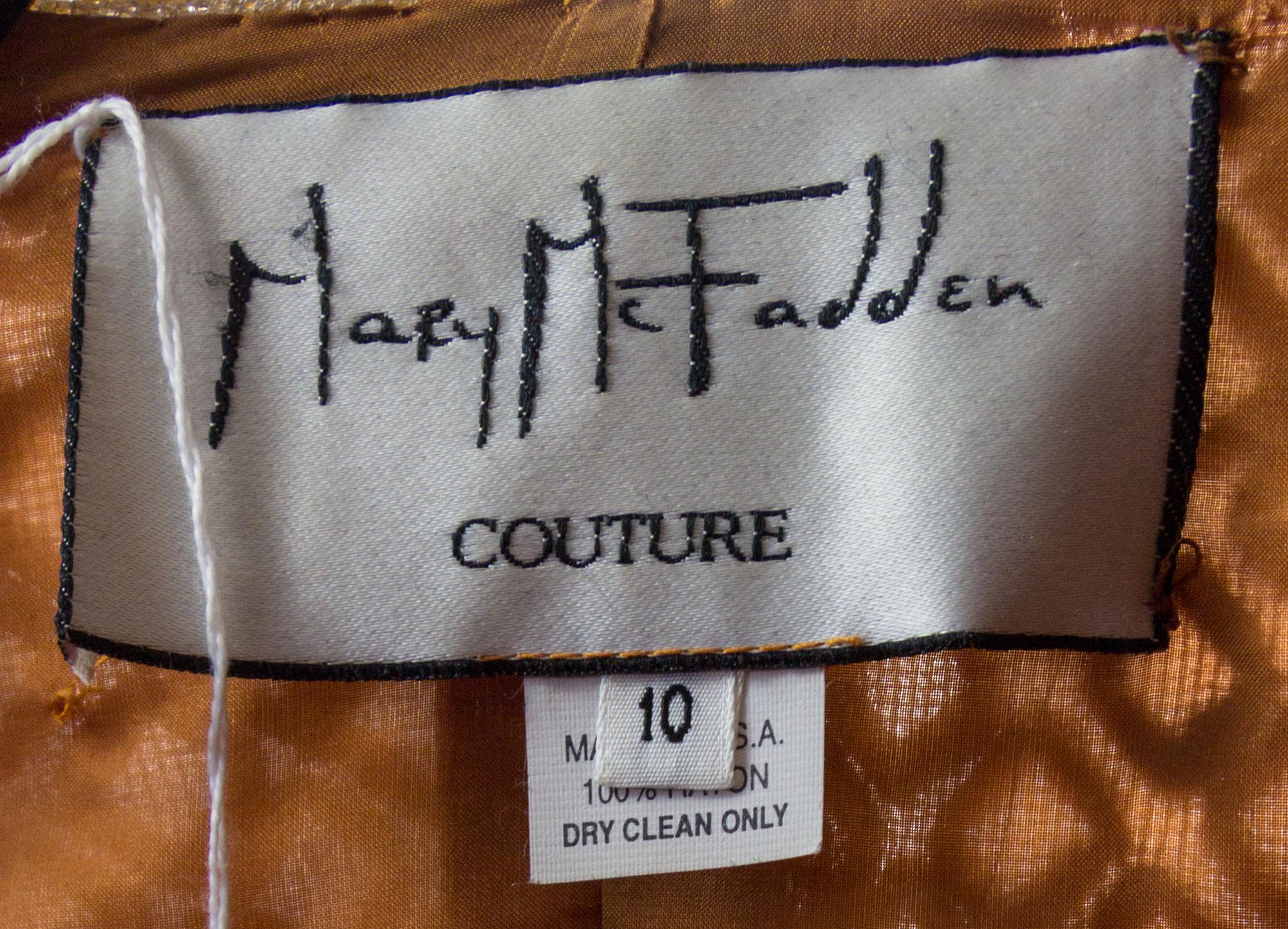 A Mary McFadden Gold Embroidered Evening Coat, Size 10.