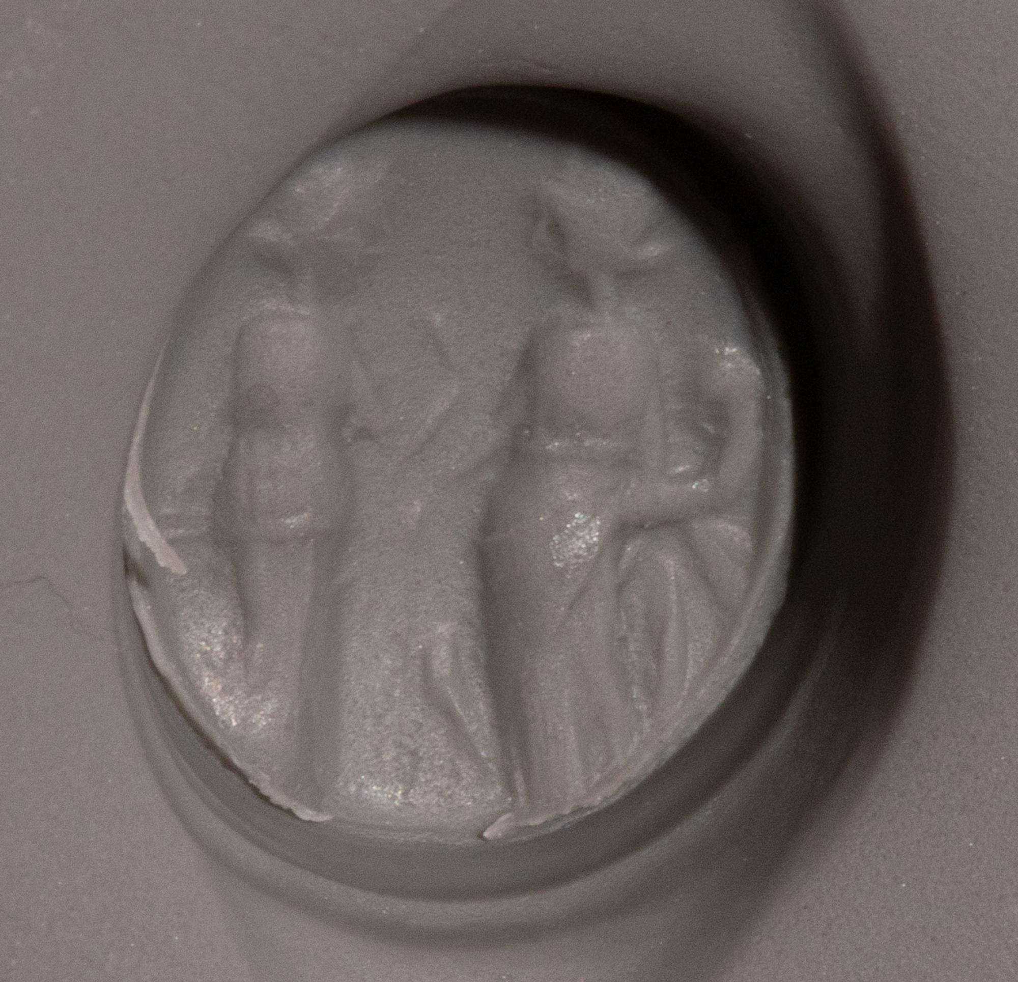 A Roman Gold and Carnelian Finger Ring with the Goddesses Ceres and Persephone