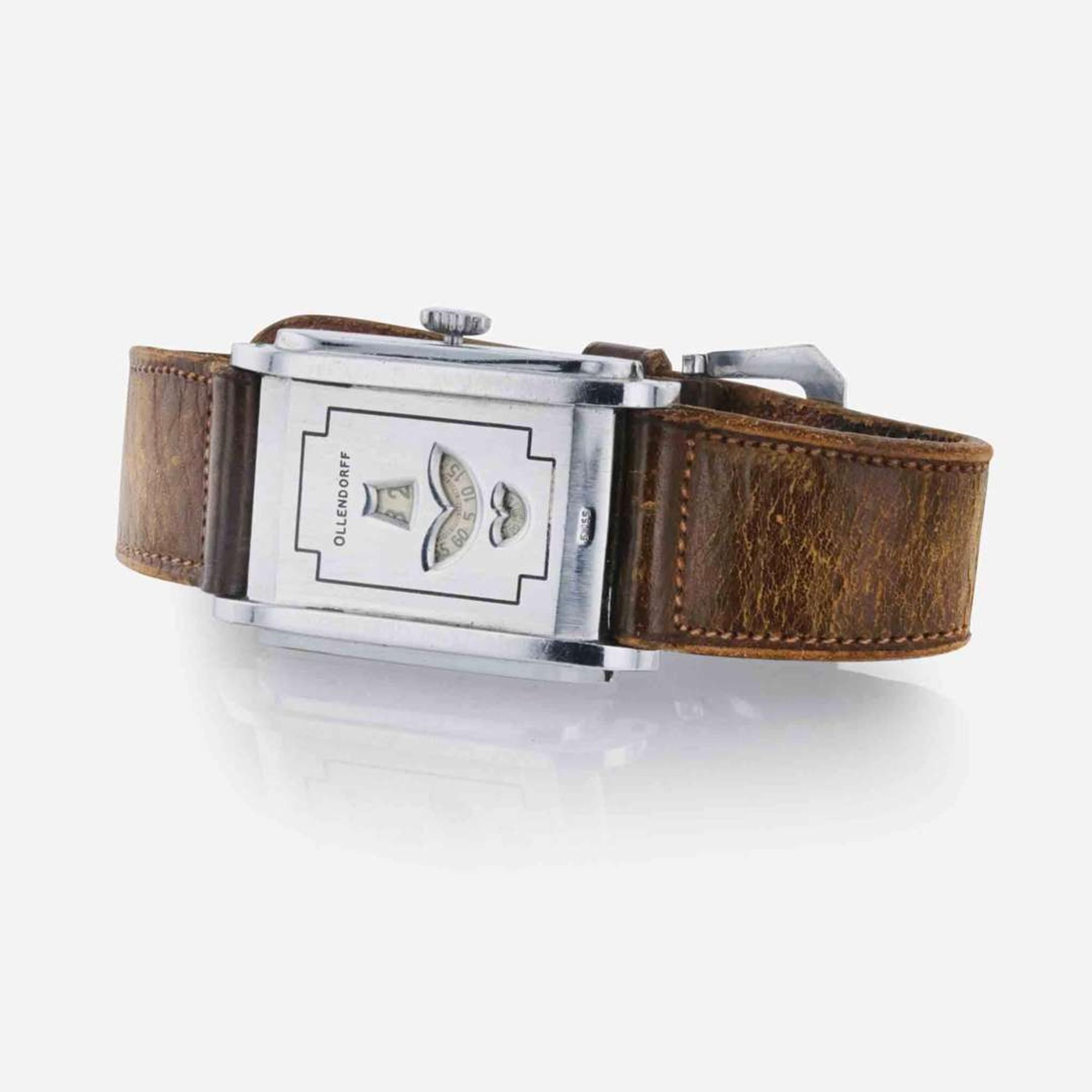 A Collection of Two Men's Rings and Wristwatch