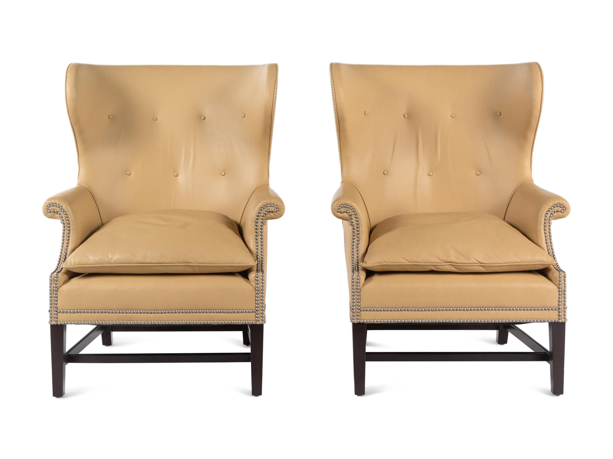 A Pair of Victoria Hagan Leather-Upholstered Wingback Armchairs
