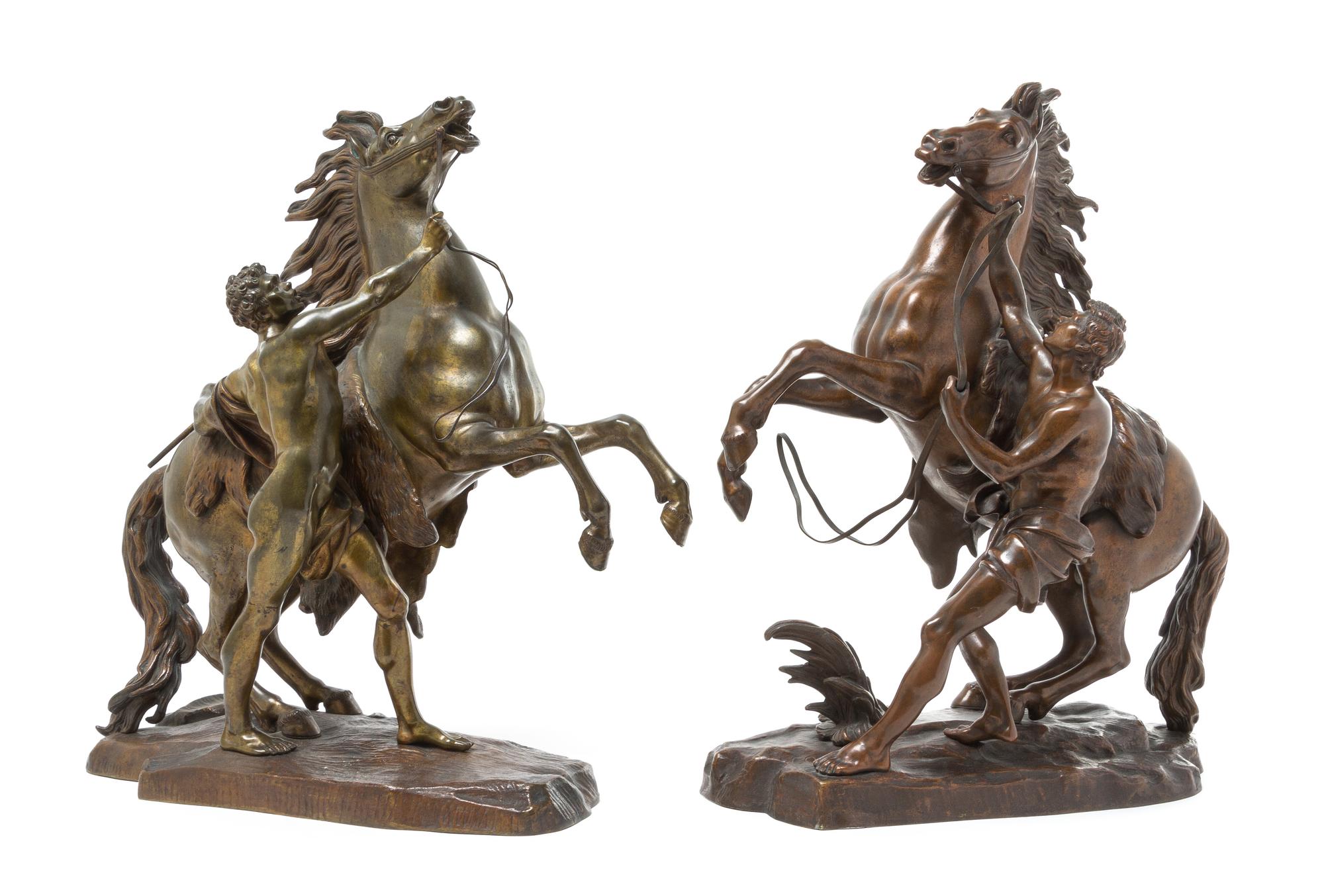 A Pair of Bronze Marly Horses Height of 17 inches. — AFTER GUILLAUME COUSTOU (FRENCH, 1677-1746)