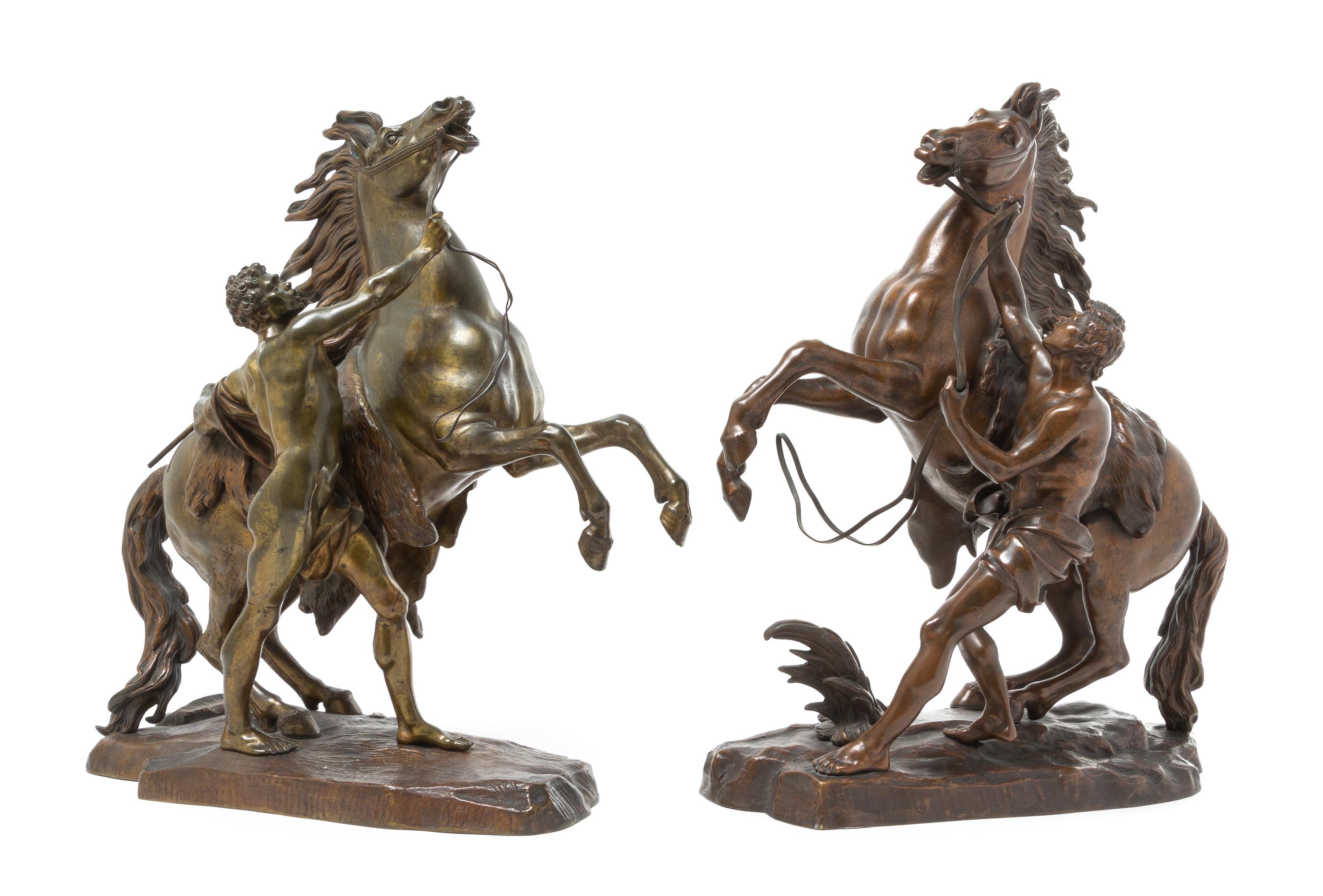 A Pair of Bronze Marly Horses Height of 17 inches. — AFTER GUILLAUME COUSTOU (FRENCH, 1677-1746)