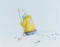 Figure in yellow jacket