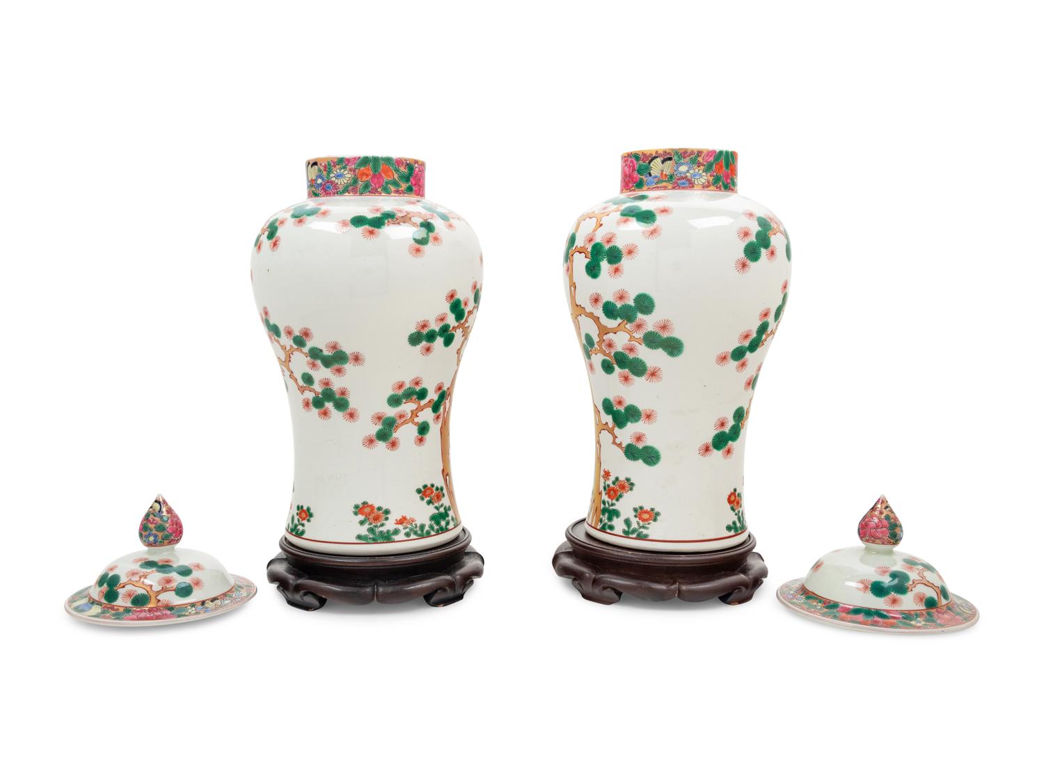 A Pair of Chinese Export Famille Rose Porcelain Covered Jars on Associated Stands