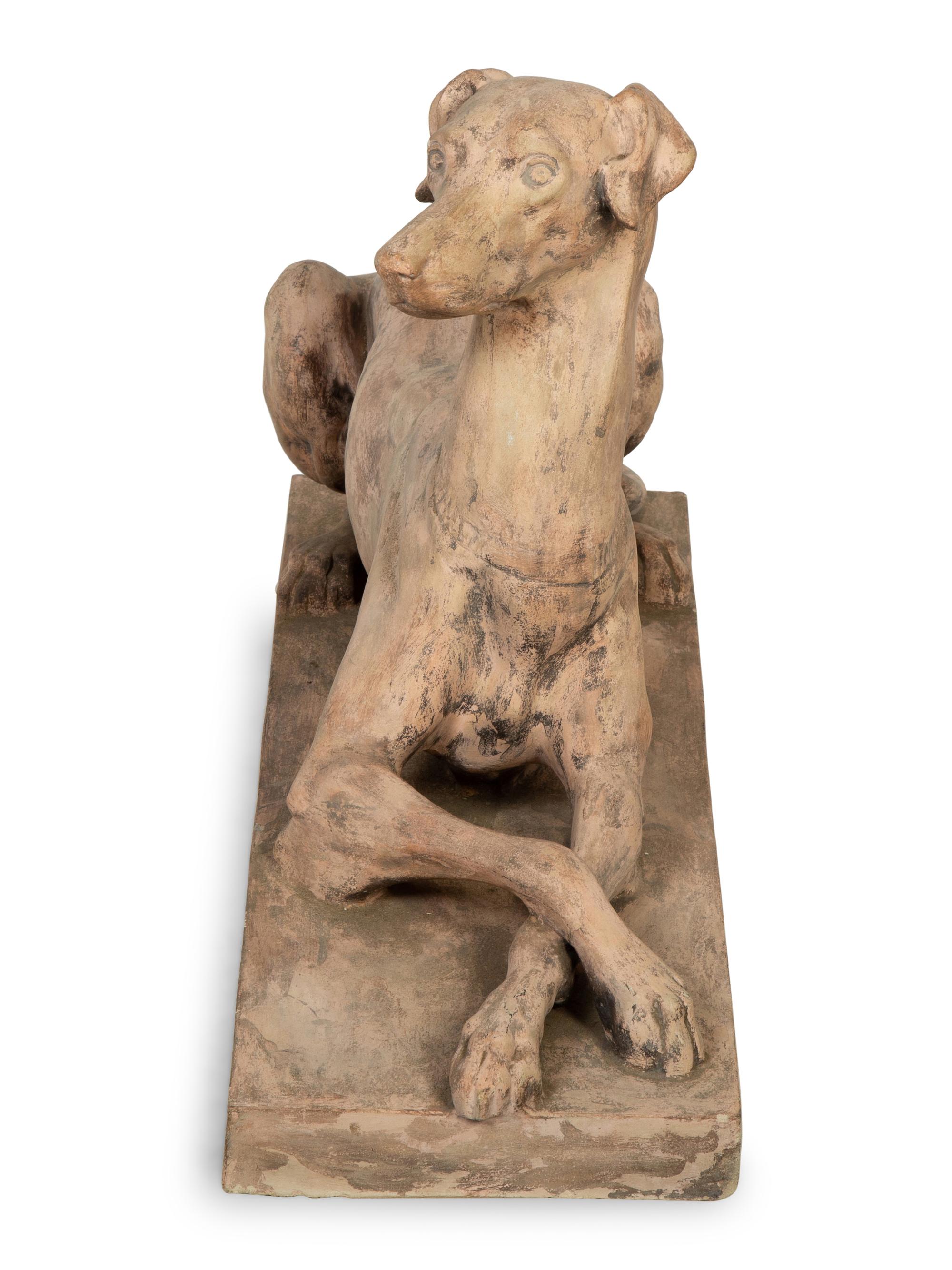 A Terra Cotta Model of a Recumbent Hound