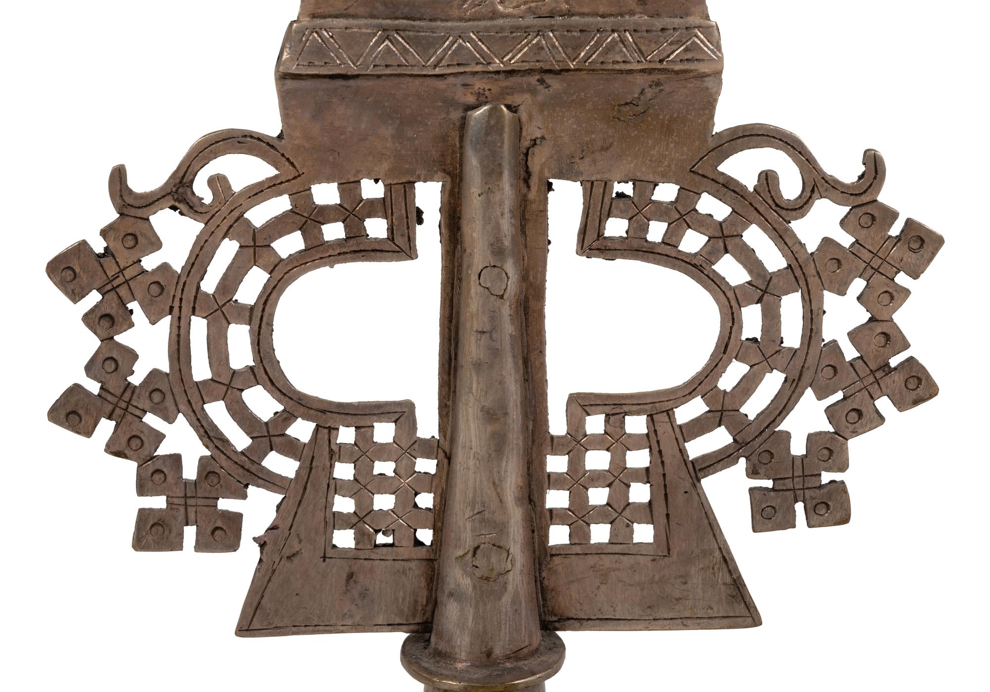 A Coptic Silvered Metal Processional Cross on Stand