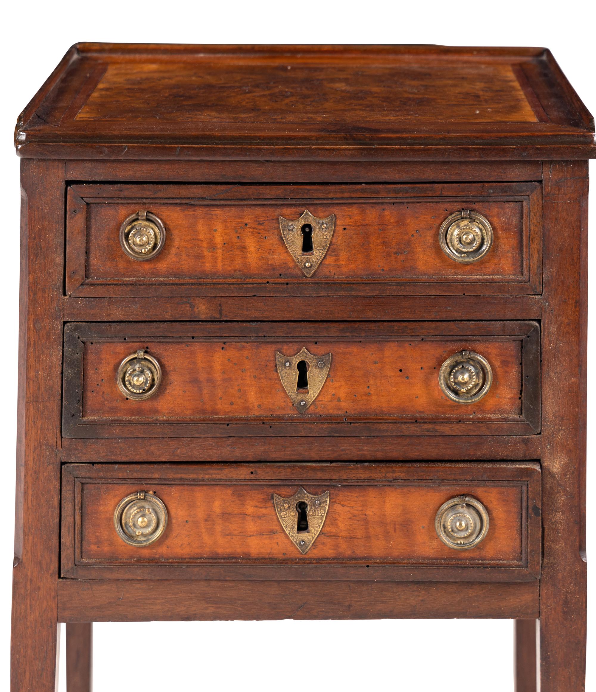 A Directoire Burlwood and Walnut Chiffonière