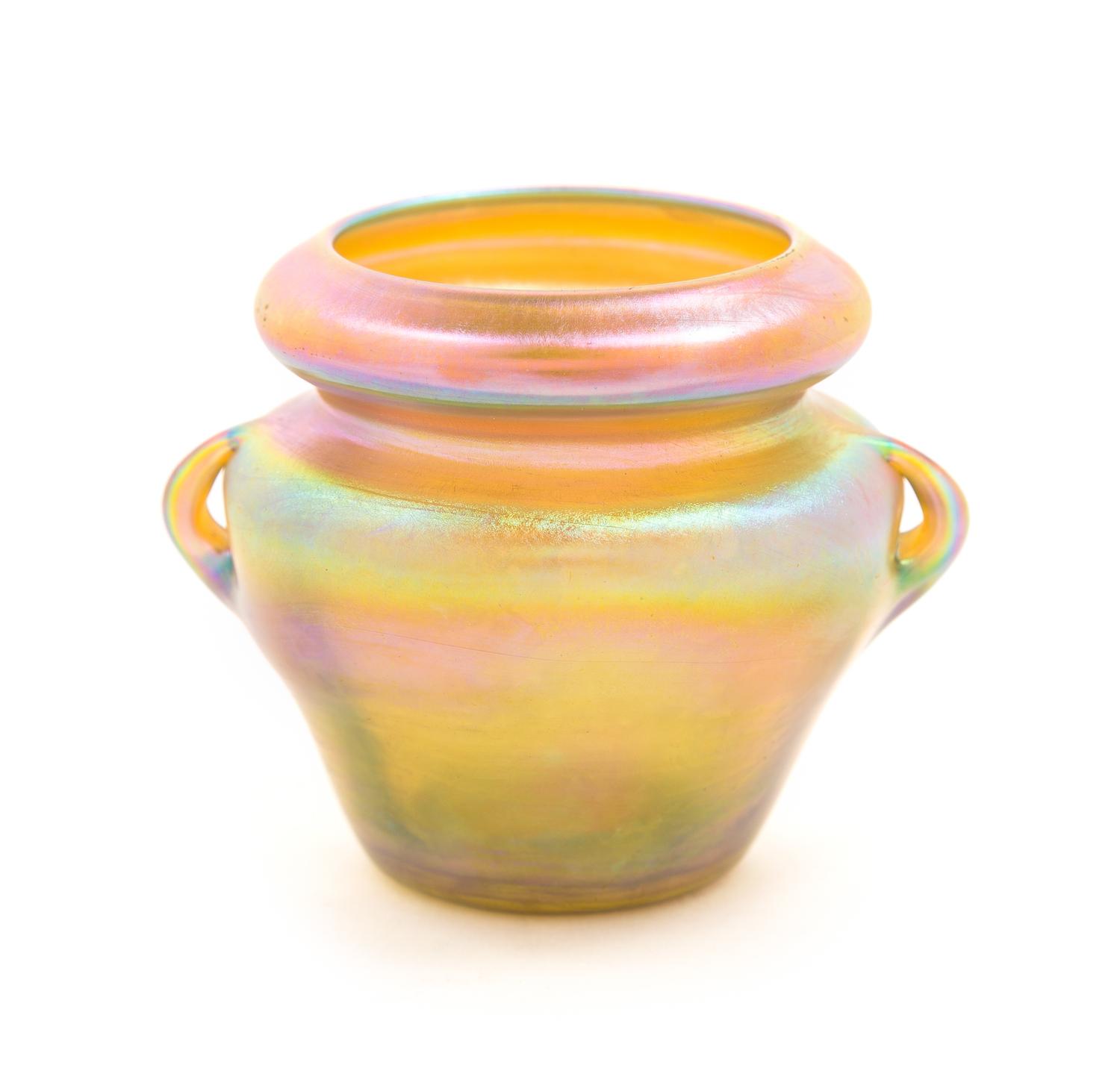 Tiffany Studios, EARLY 20TH CENTURY, a Favrile glass handled vase, with gold iridescence