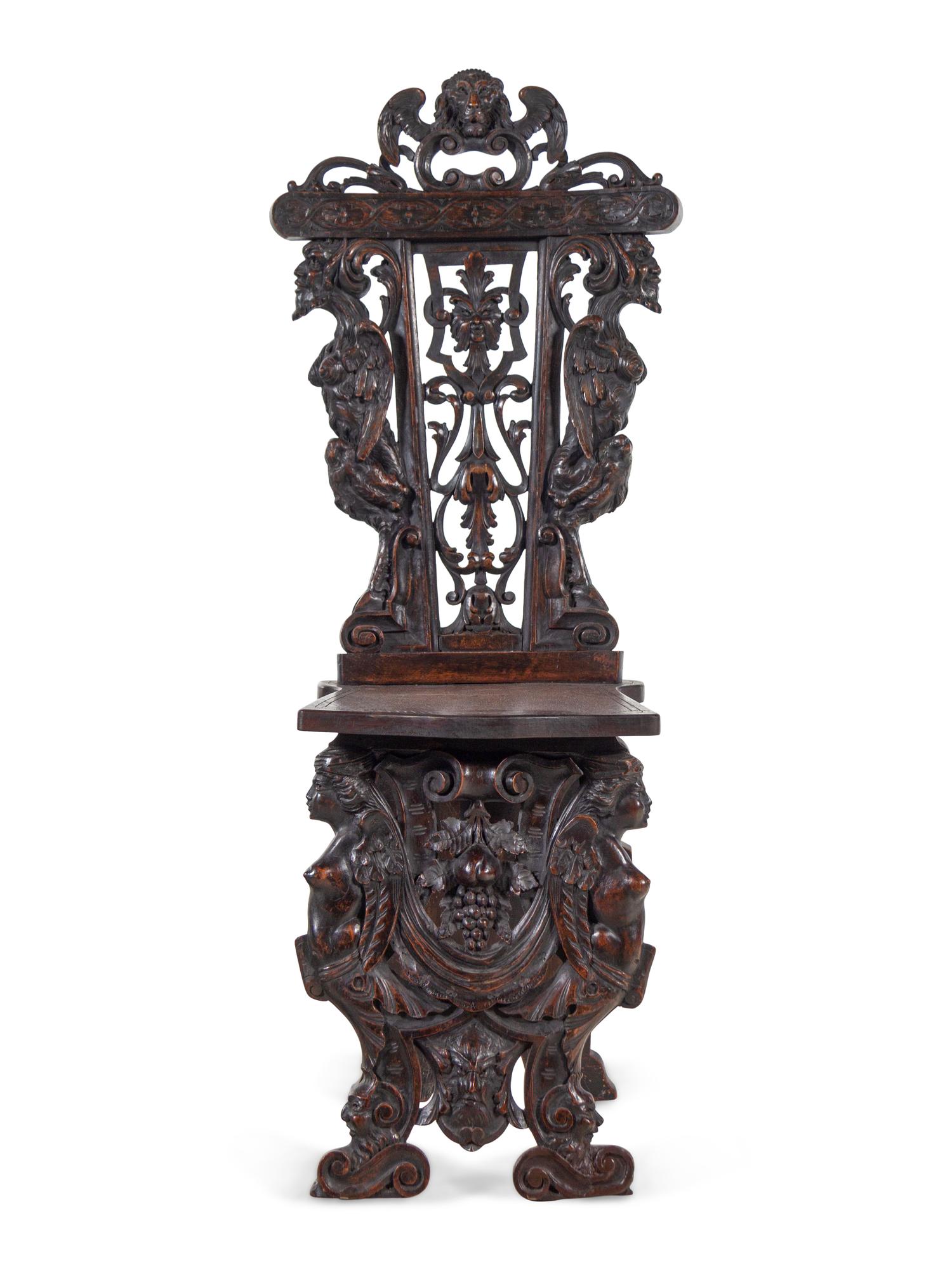 An English Renaissance Revival Carved Mahogany Hall Chair