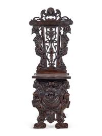 An English Renaissance Revival Carved Mahogany Hall Chair
