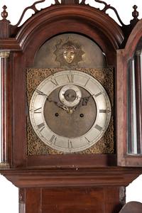 A Federal Carved Cherrywood Tall Case Clock