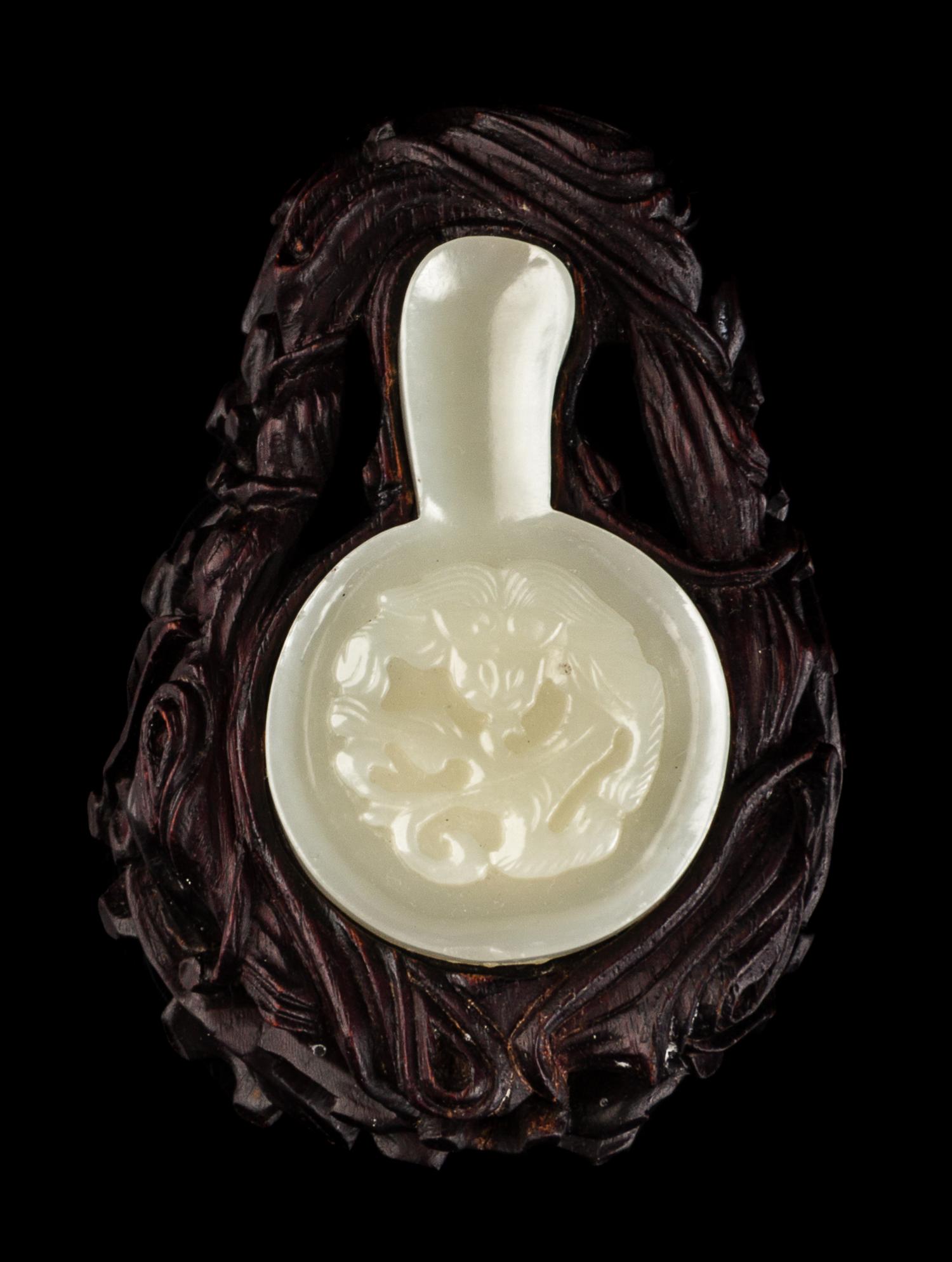 A Chinese Carved Jade Brushrest, Bitian