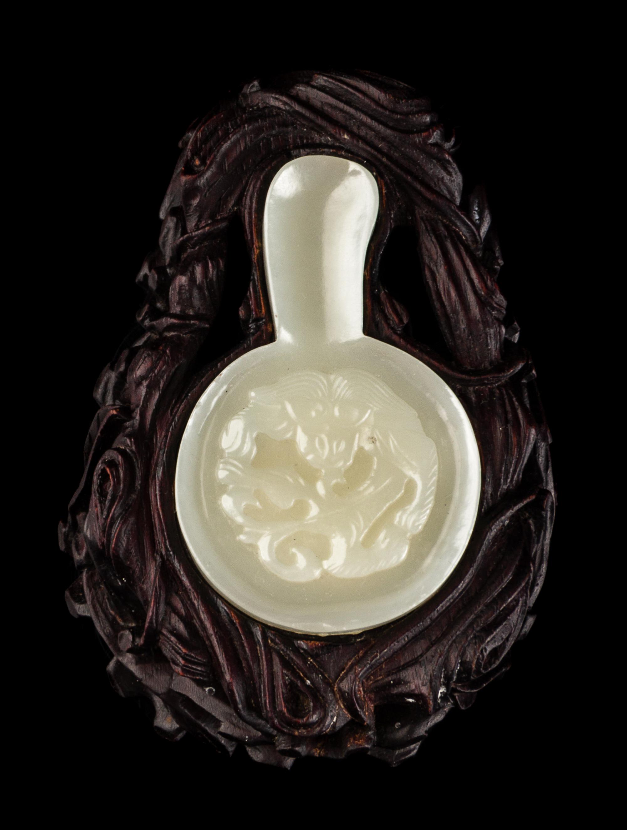 A Chinese Carved Jade Brushrest, Bitian