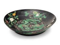 A Chinese Black Ground Famille Verte Porcelain Plate