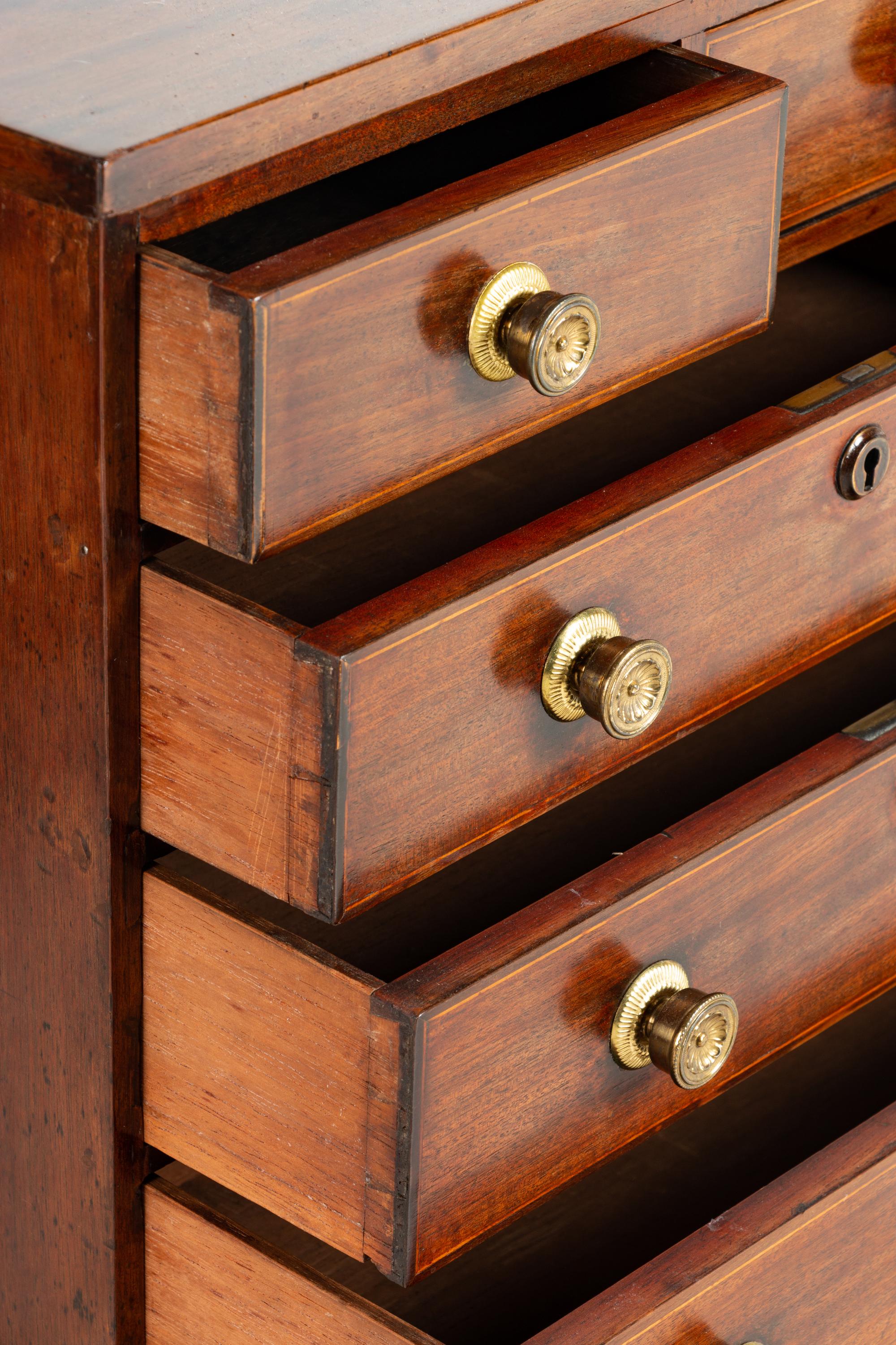 A Directoire Diminutive Walnut Secrétaire à Abattant and a Similar Diminutive Cabinet