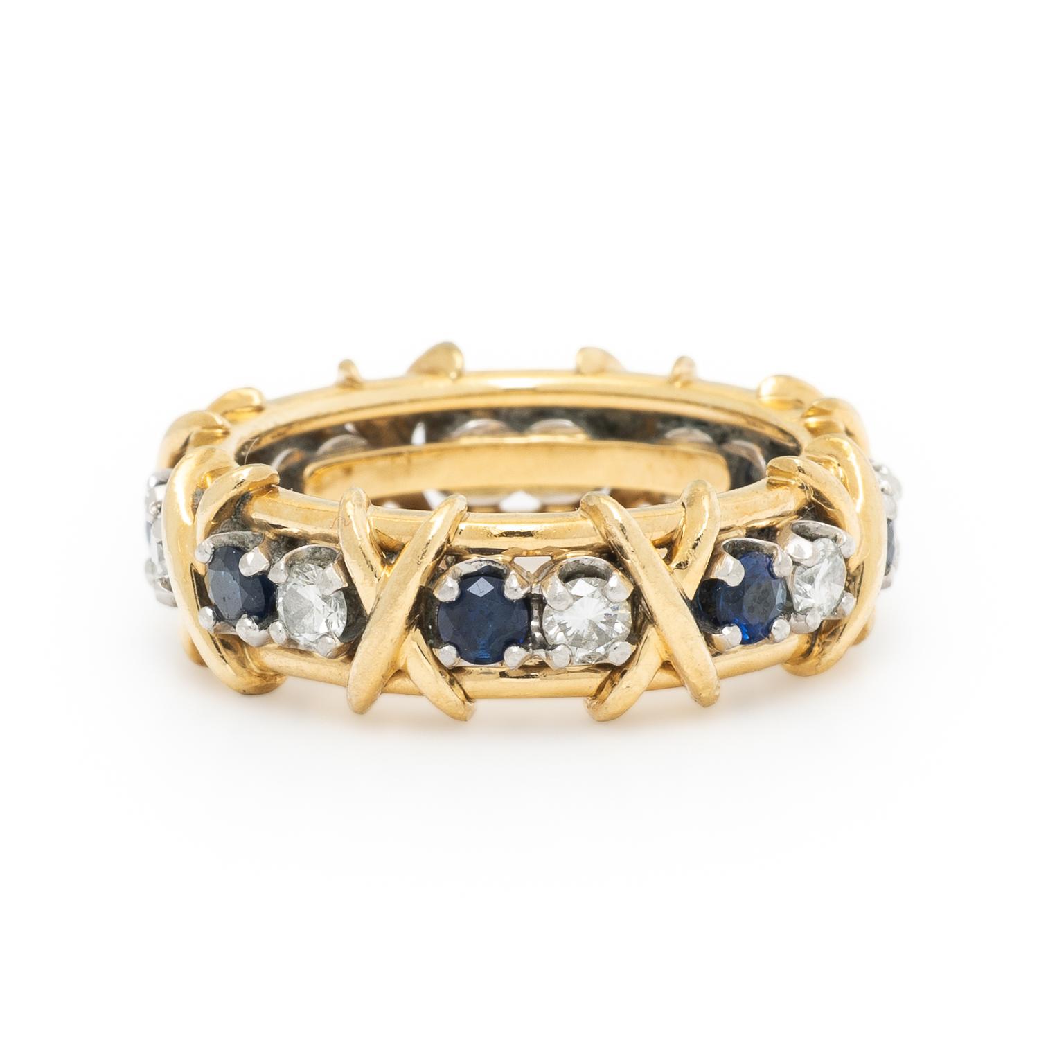TIFFANY & CO., SCHLUMBERGER, SAPPHIRE AND DIAMOND 'SIXTEEN STONE' RING