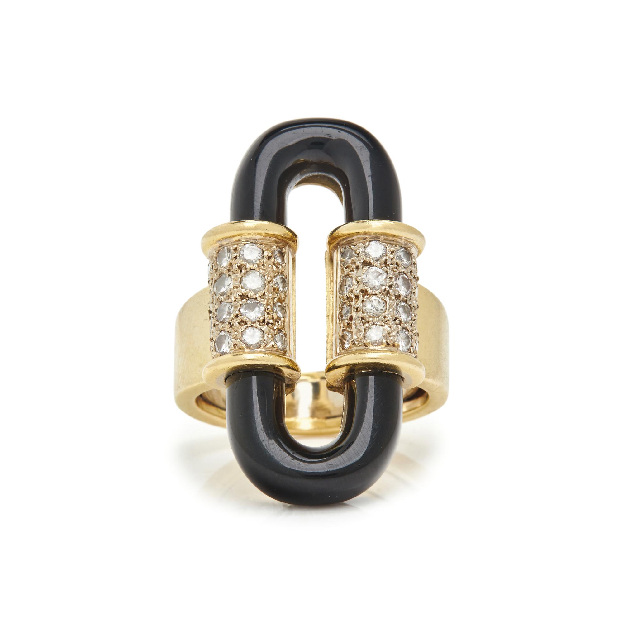 YELLOW GOLD, DIAMOND AND ONYX RING