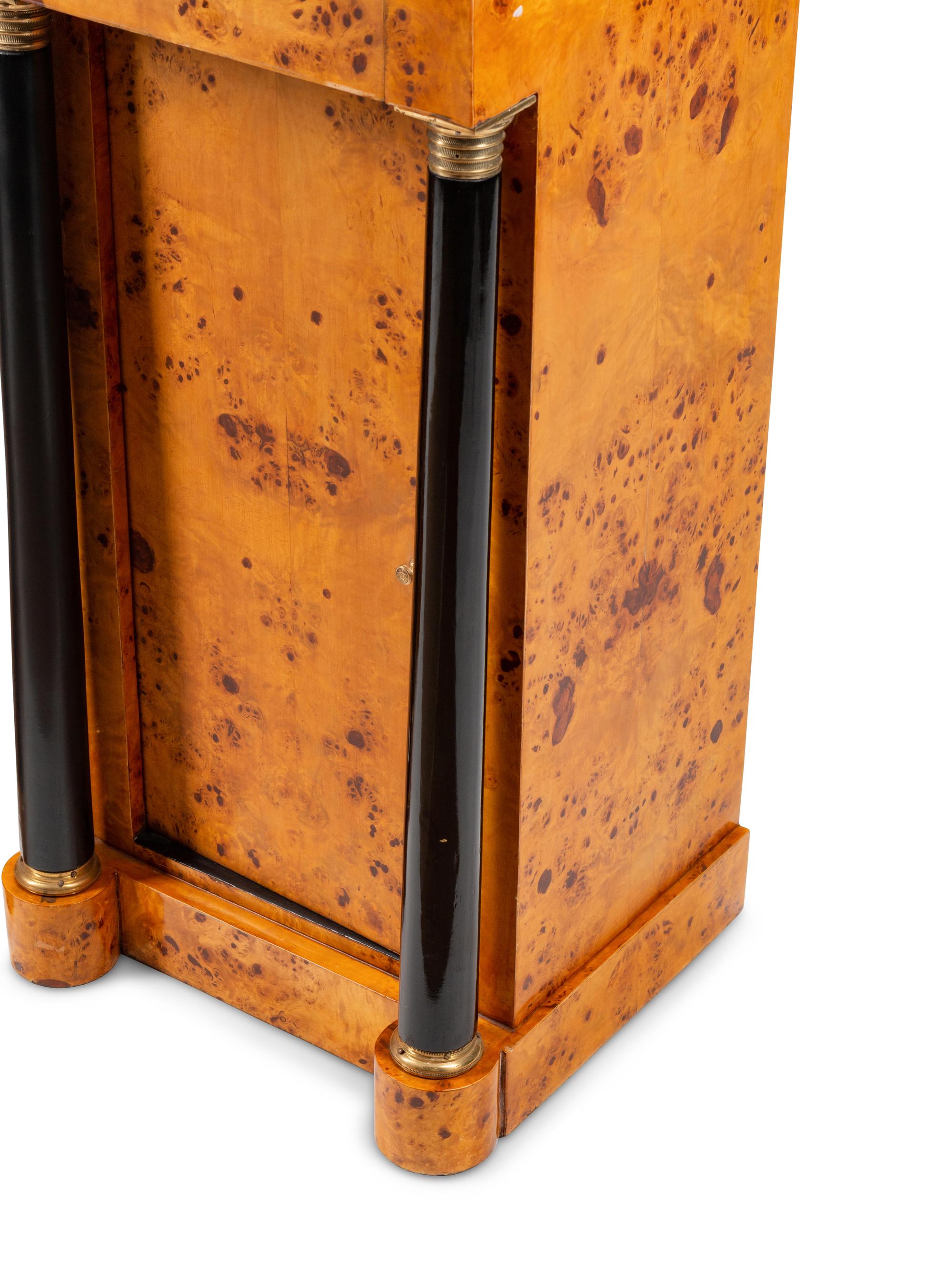 A Pair of Empire Style Part-Ebonized Burlwood Marble-Top Side Cabinets