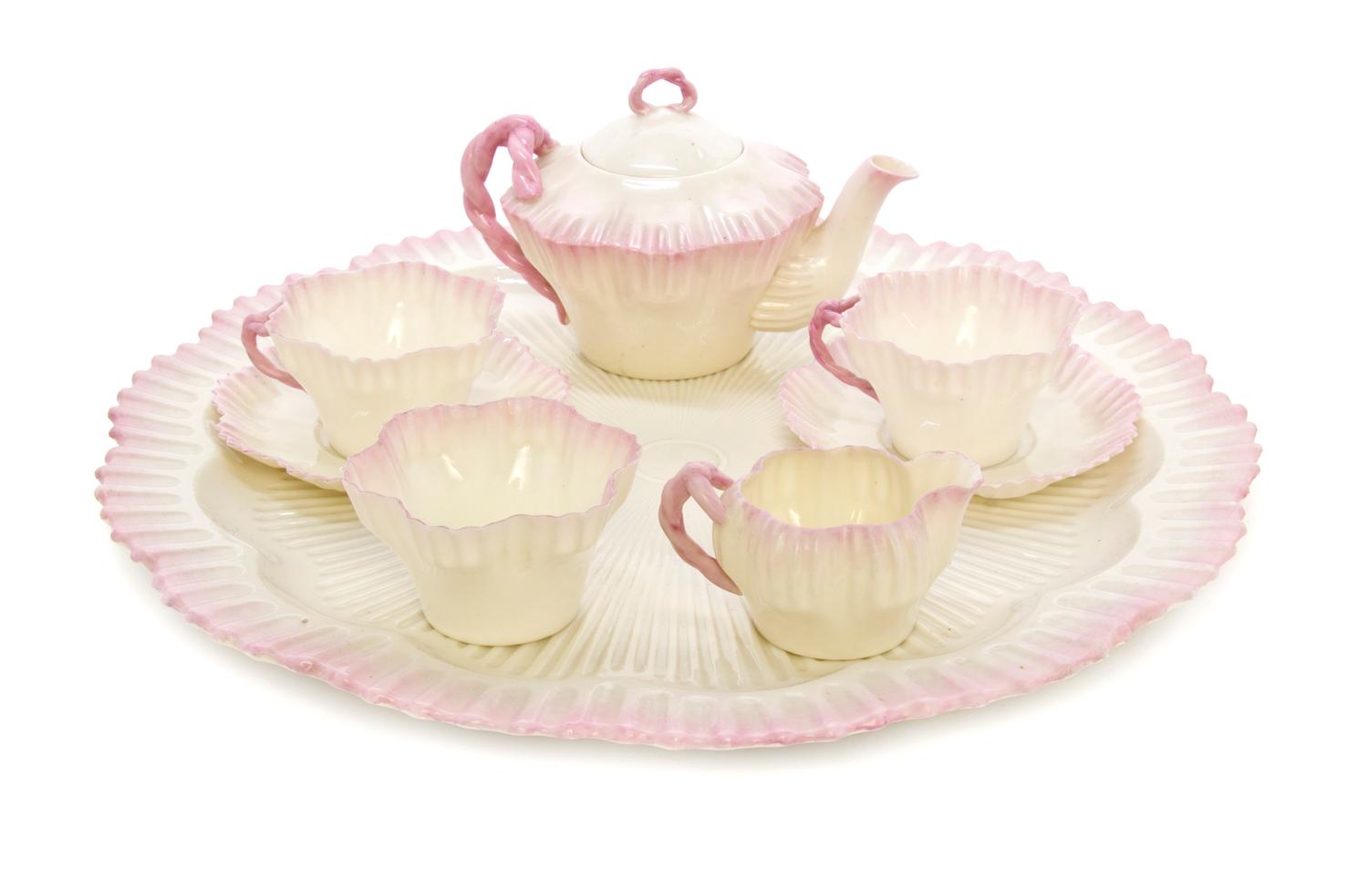 A Belleek Hexagon Tea Service, Diameter of largest 16 1/2 inches.