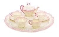 A Belleek Hexagon Tea Service, Diameter of largest 16 1/2 inches.
